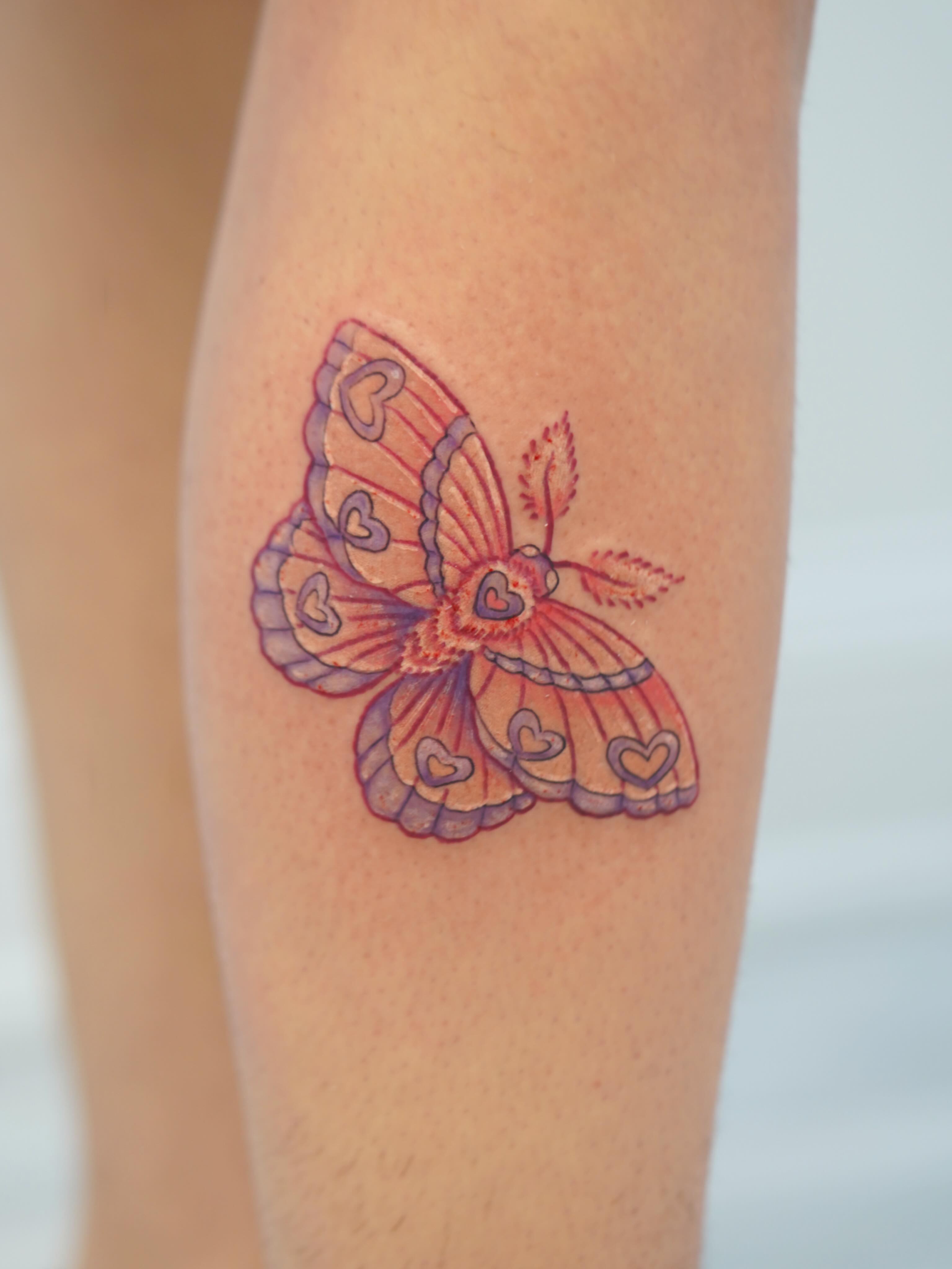 Butterfly new school tattoo on the calf by Skylar