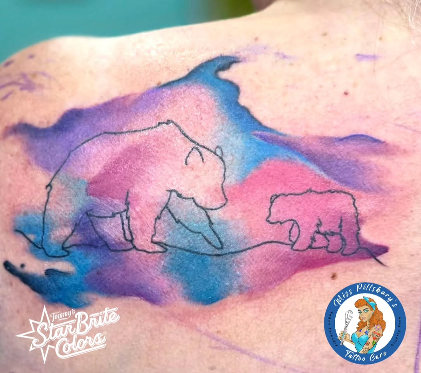 Polar bears watercolor tattoo on the shoulder by Black Lantern Tattoo Company, Niantic, Connecticut