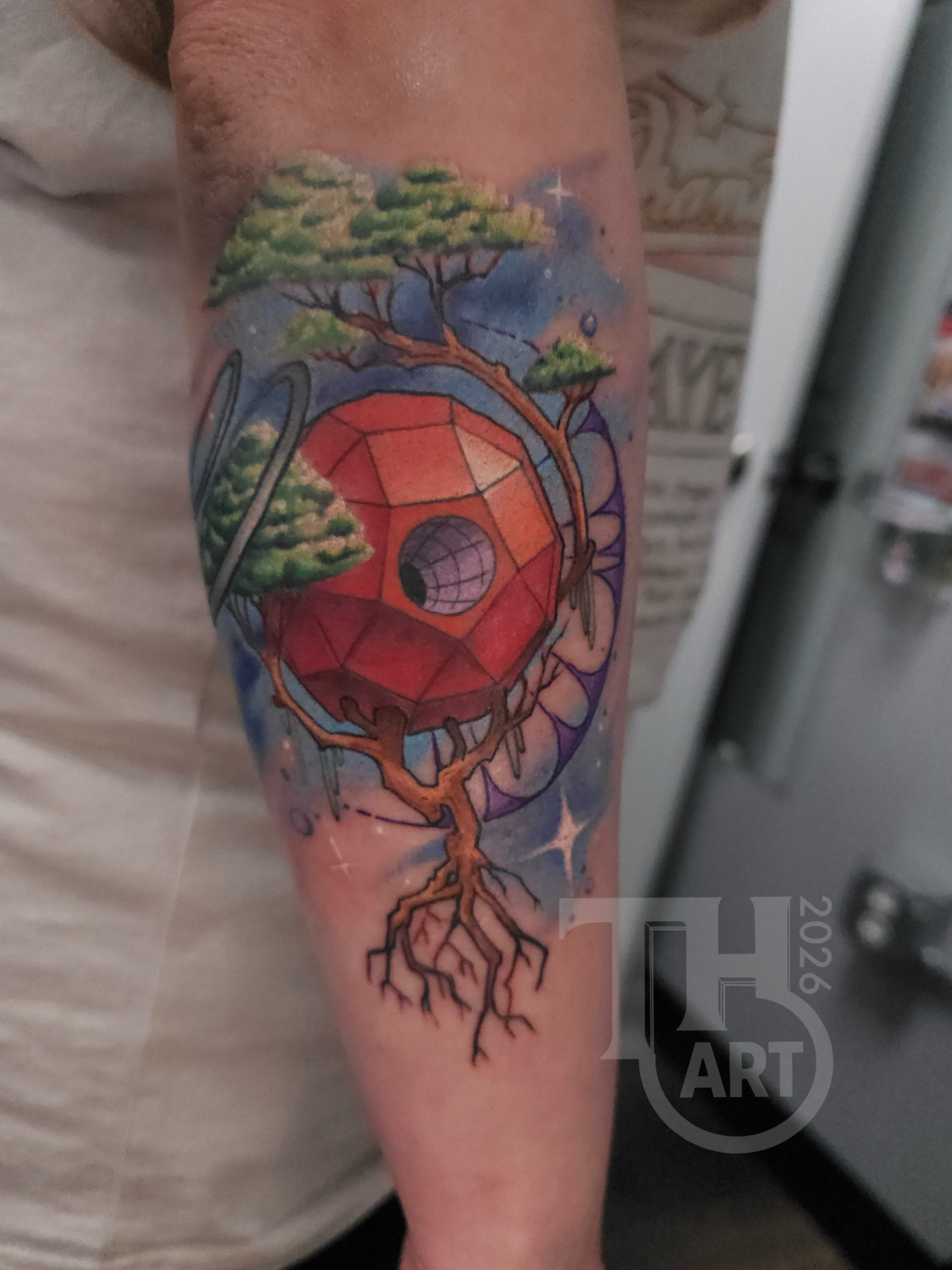 Geometric treehouse geometric tattoo on the forearm by Thomas Harris