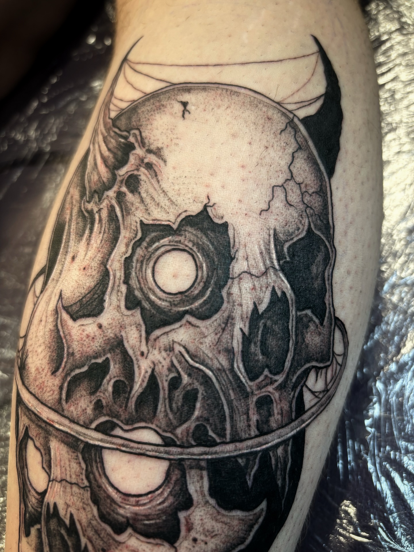 Tattoo by @scorchedbones_ — dotwork, realism