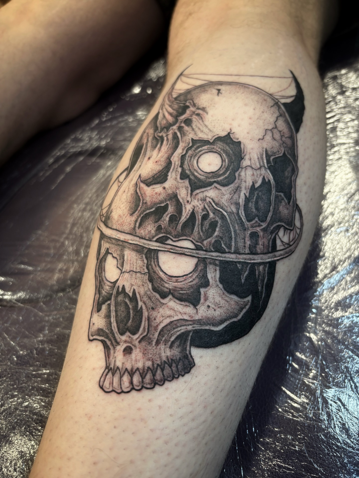 Tattoo by @scorchedbones_ — black_and_grey, realism