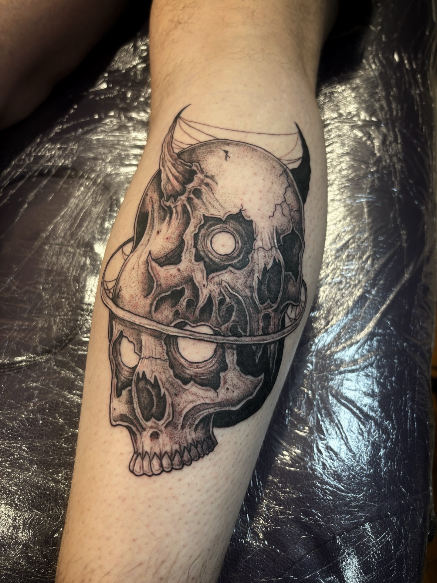 Tattoo by @scorchedbones_ — black_and_grey, realism