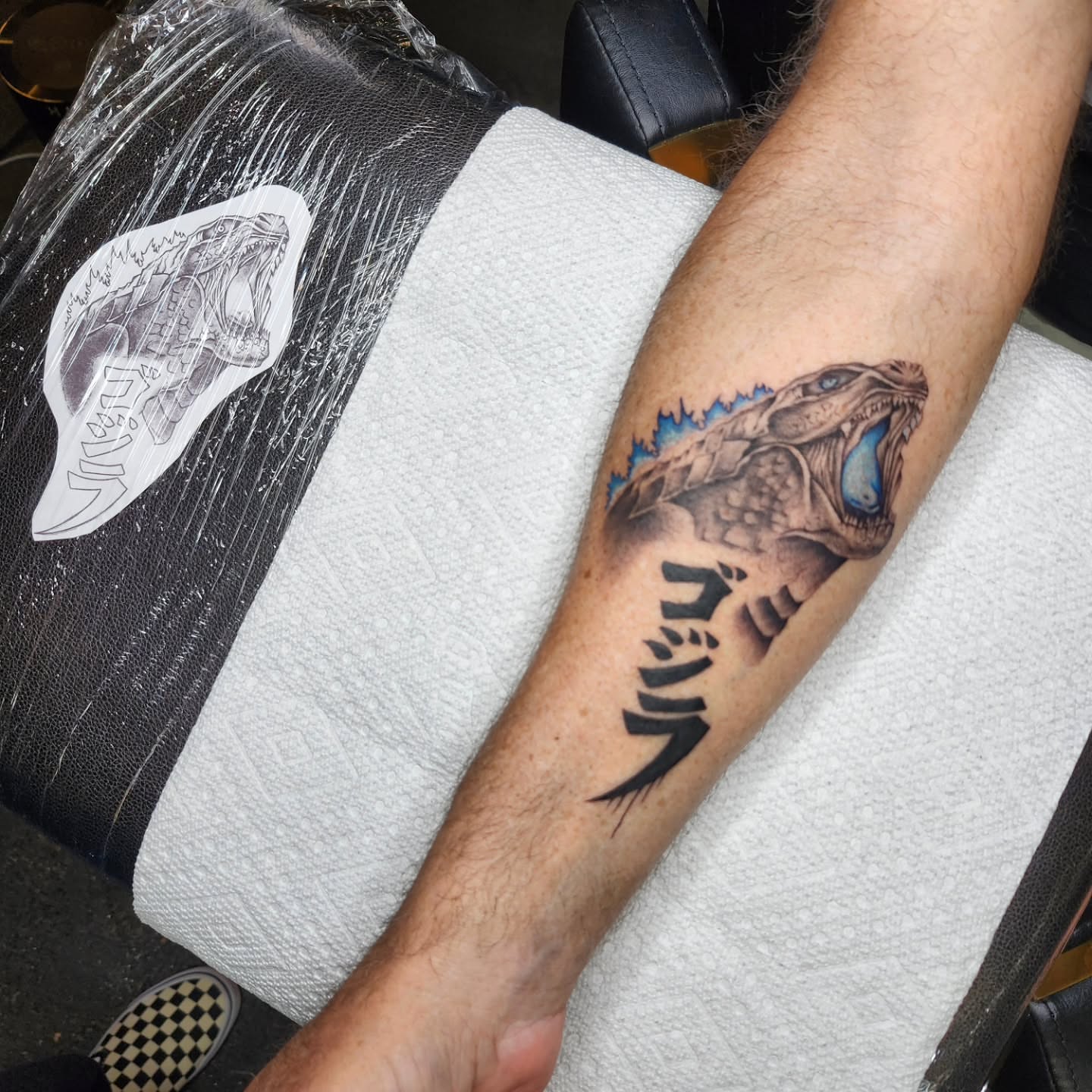 Dinosaur realism tattoo on the forearm by Kelly Zito