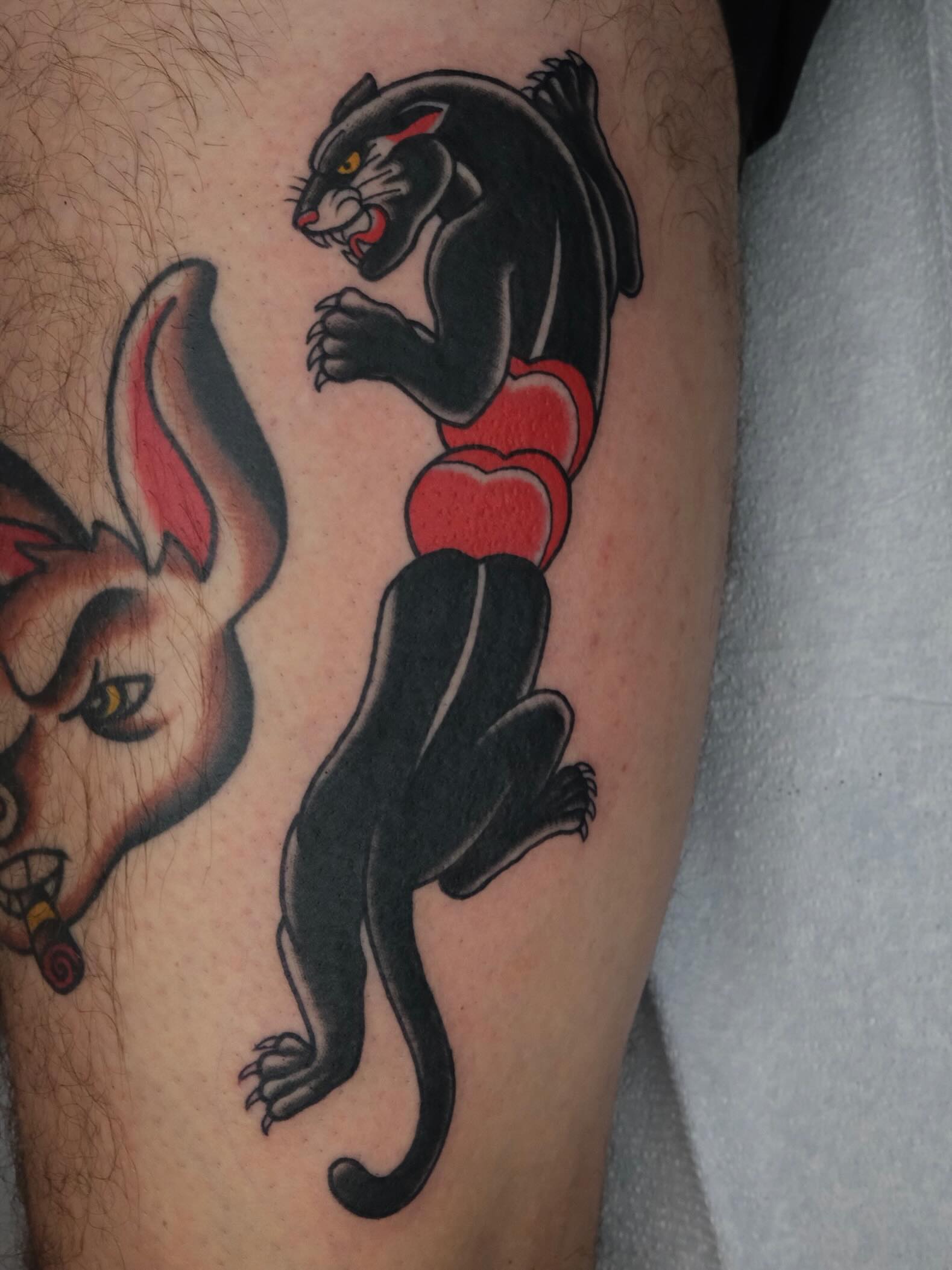 Panther American traditional tattoo on the leg by James Maxwell