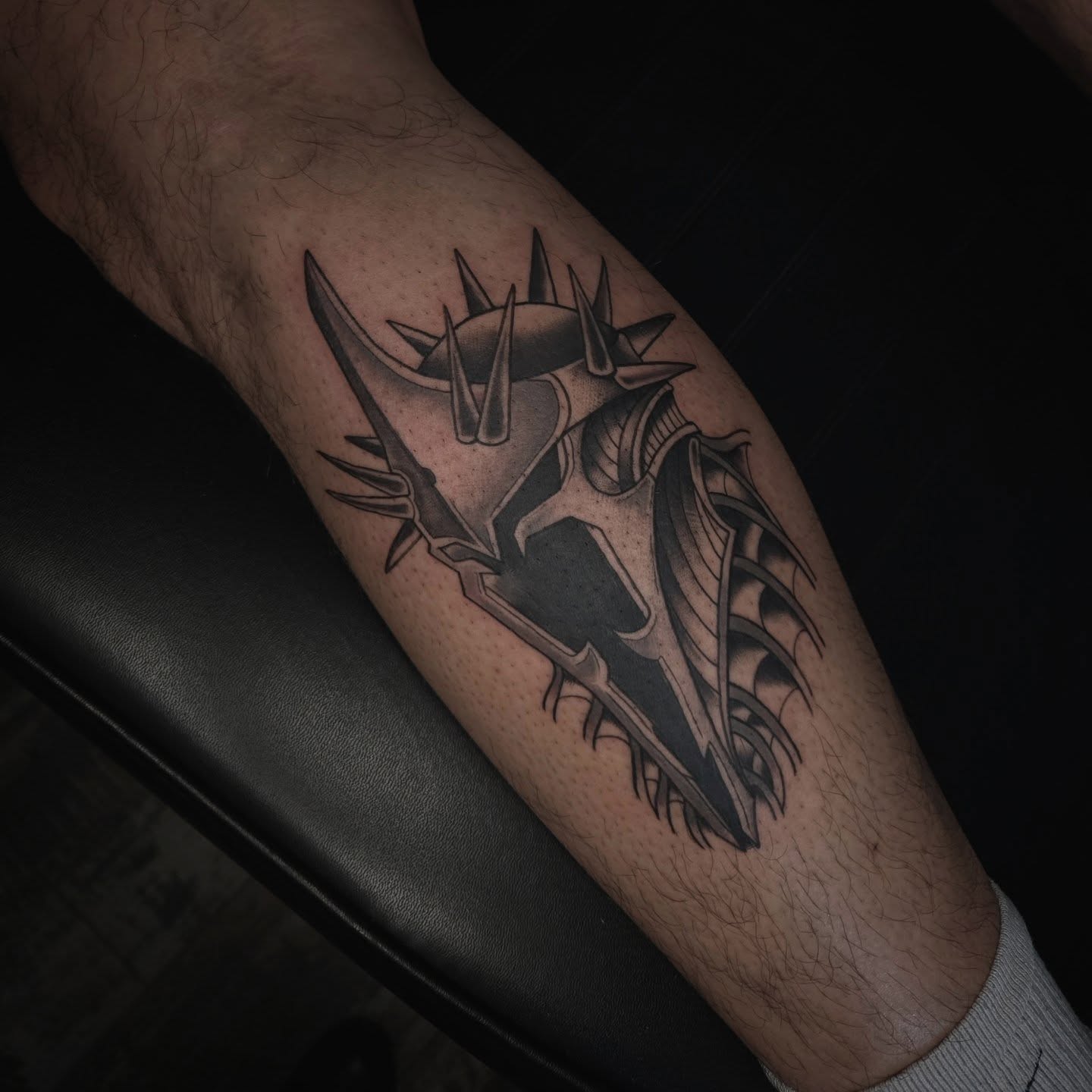 Skull with crown black and grey tattoo on the forearm by Alexandra Colella ✨️