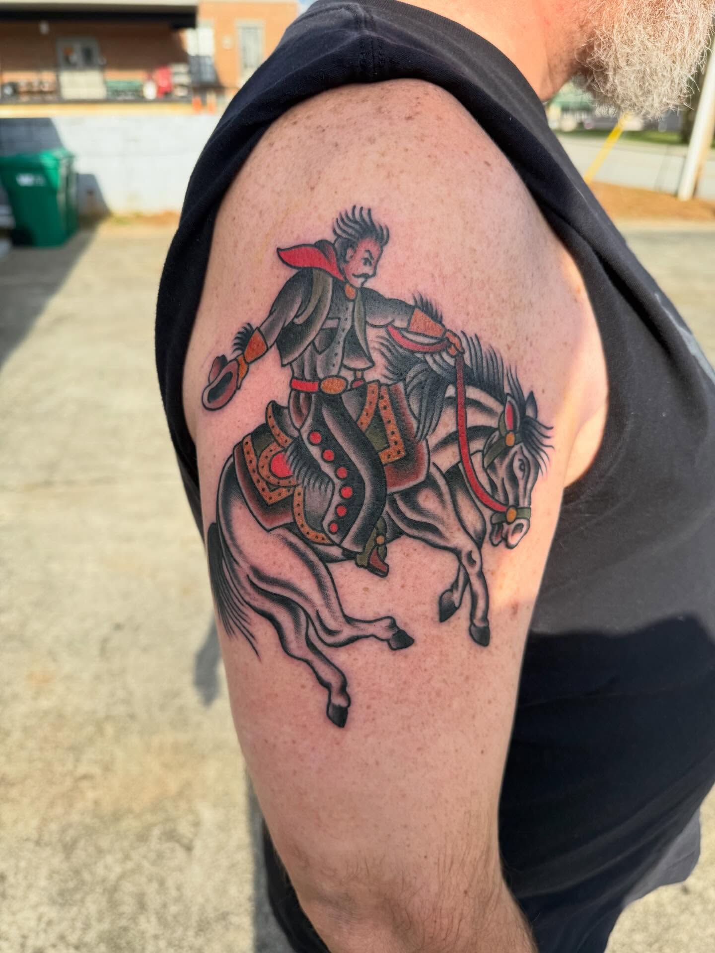 Horse rider American traditional tattoo on the shoulder by Cody Dalton