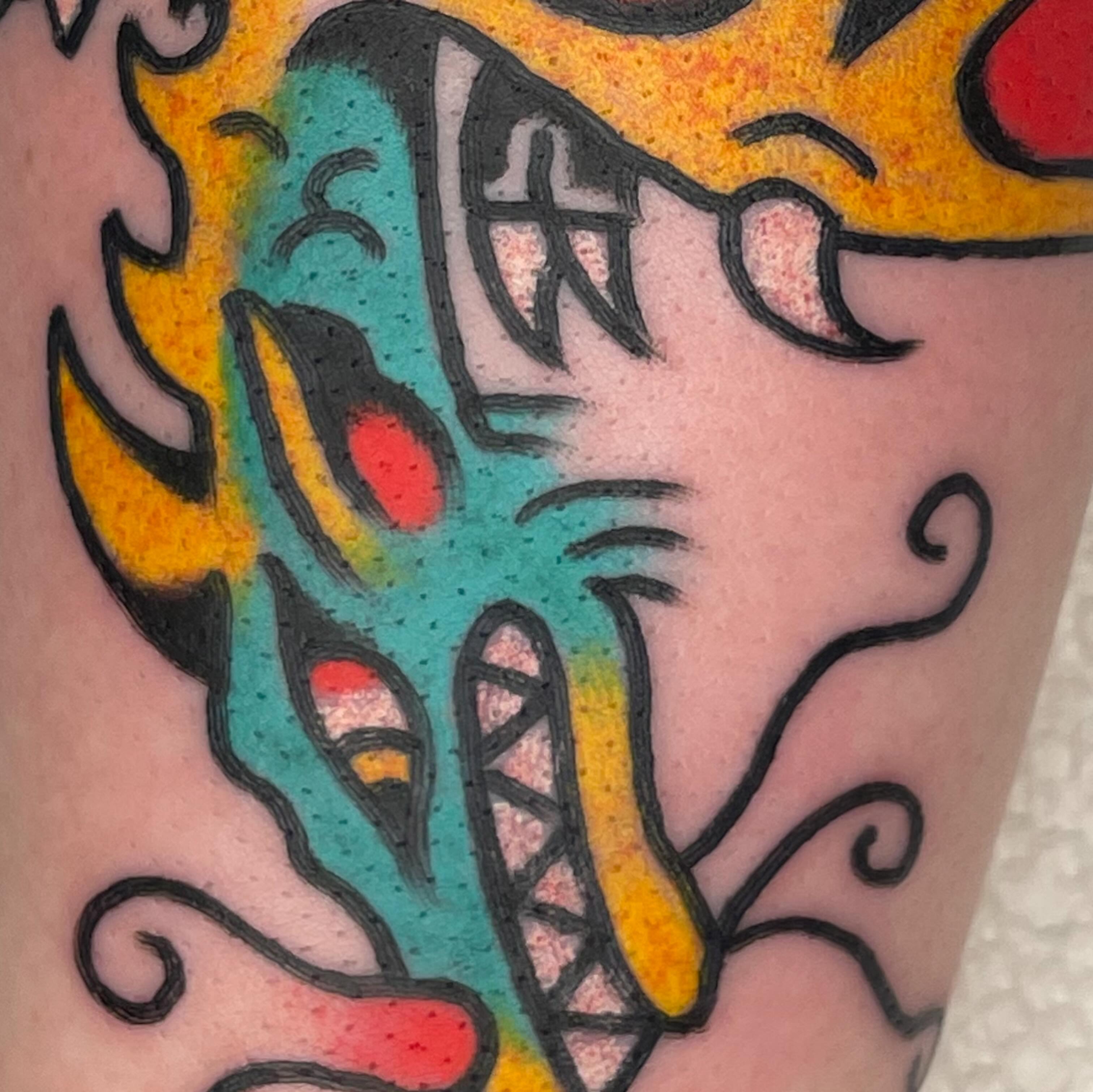 Abstract creature American traditional tattoo on the forearm by Nicholas M. Passeri