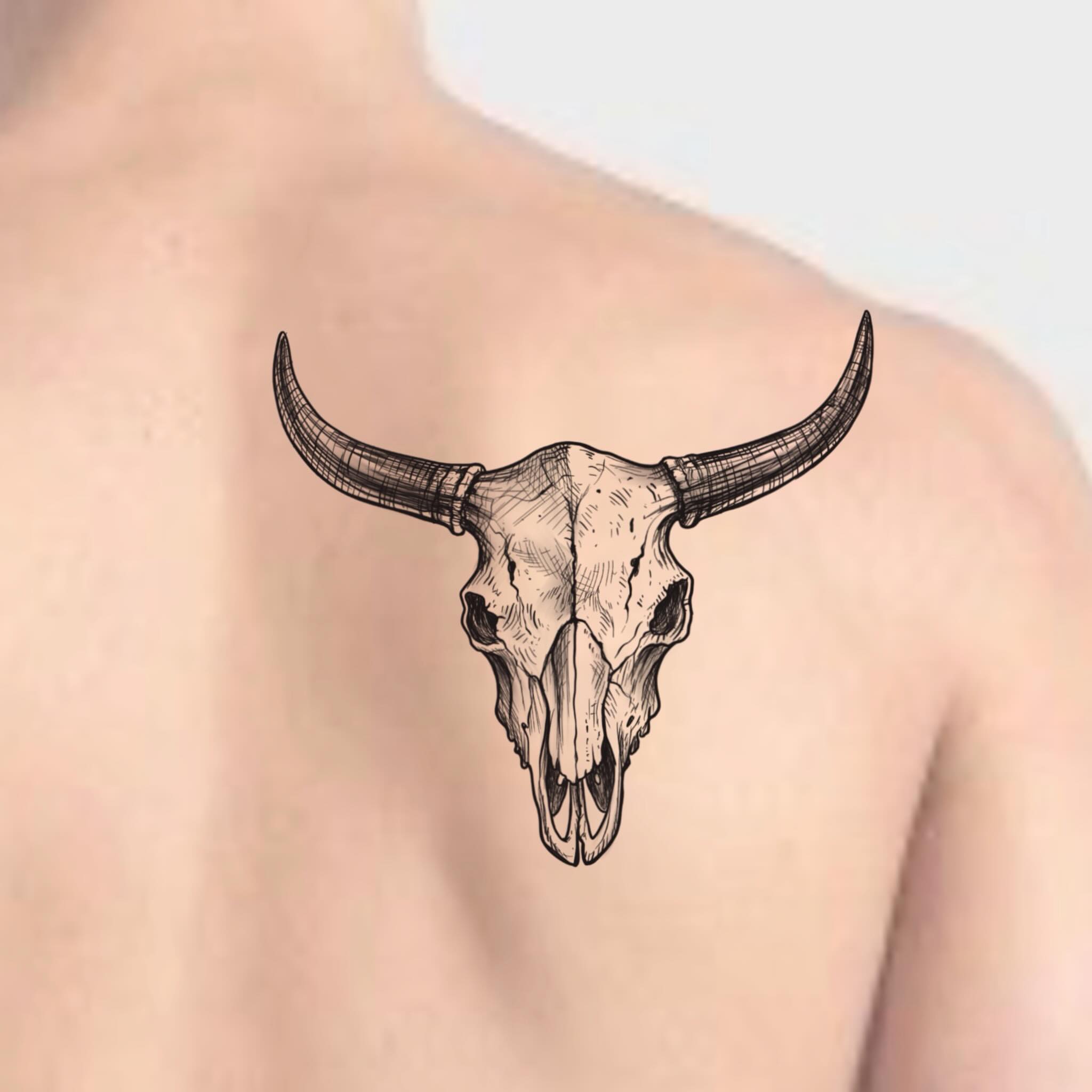 Bull skull black and grey tattoo on the shoulder by Robert McCollum