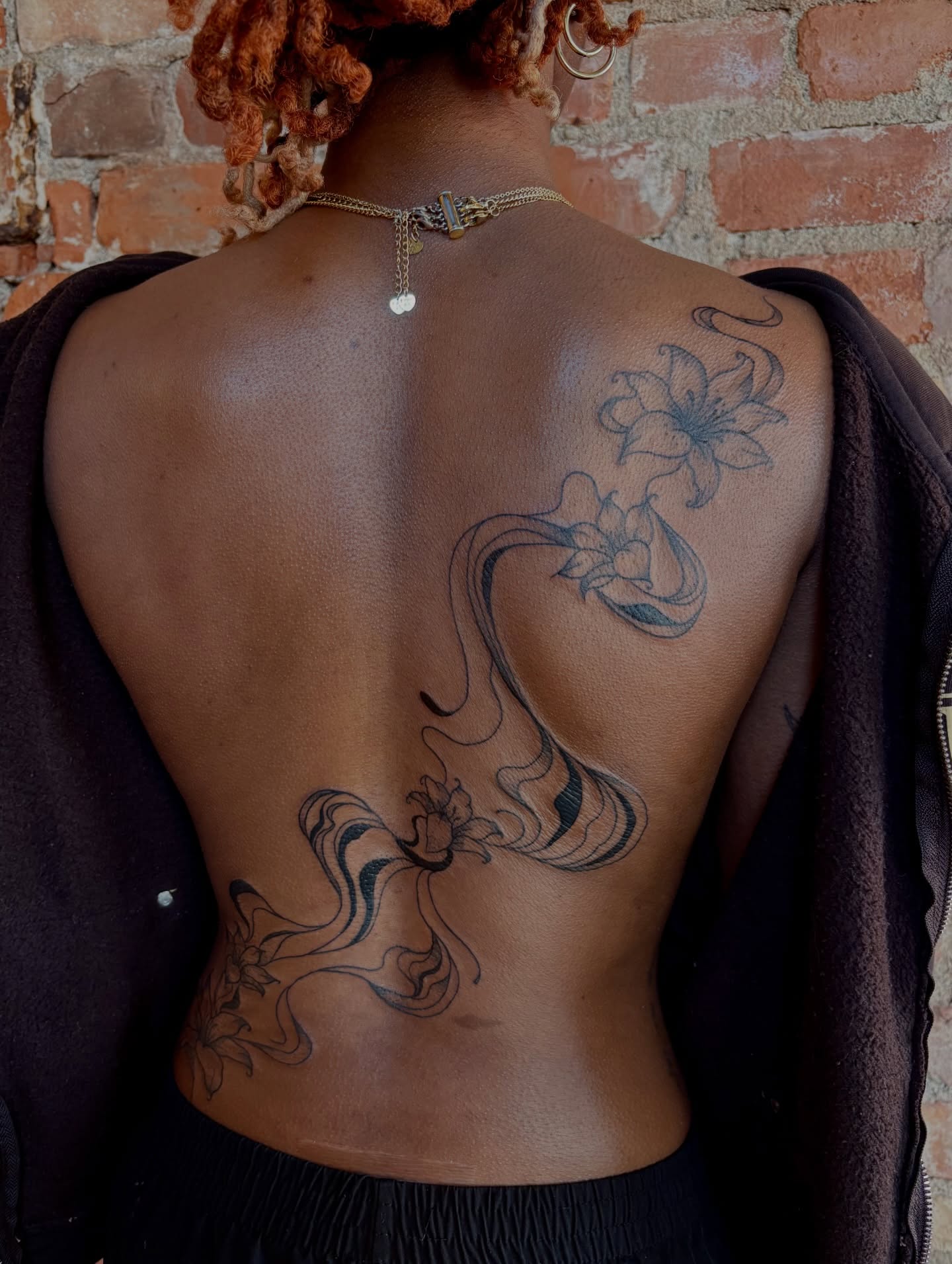 Lily and swirls black and grey tattoo on the back by Jen Osborne ♡ Cincinnati Tattoo Artist
