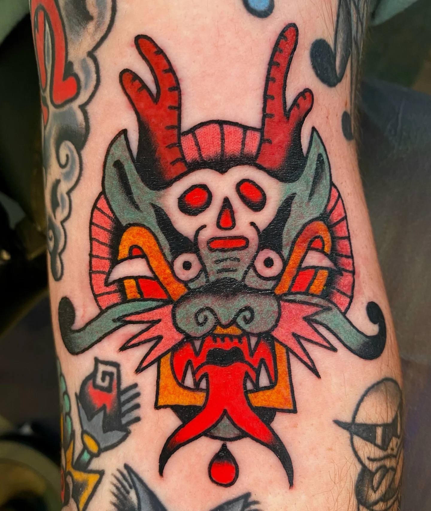 Skull with horns American traditional tattoo on the forearm by Quinn, Kansas City, Missouri