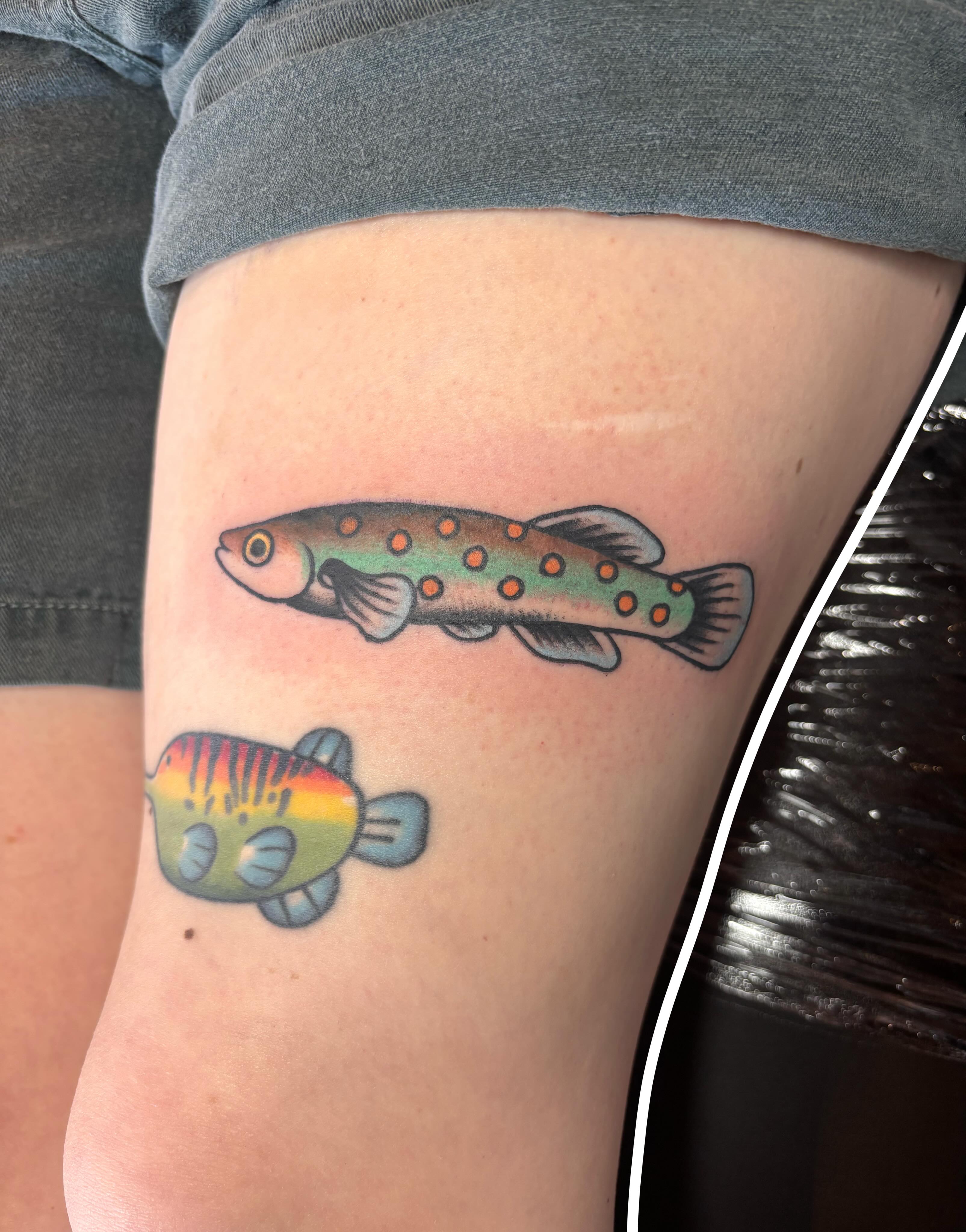 Fish American traditional tattoo on the thigh by Emmy Stepien