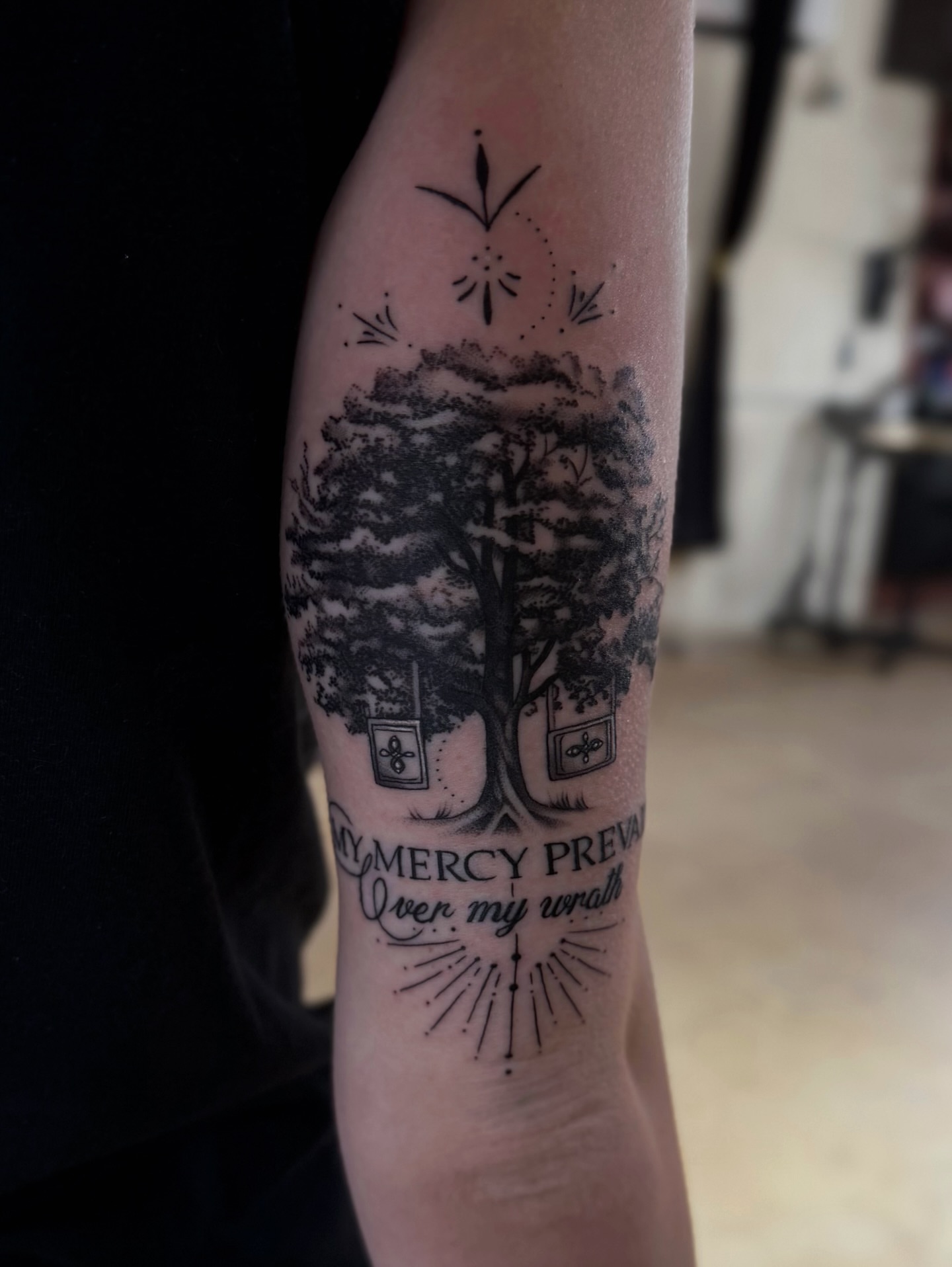 Tree with bookends black and grey tattoo on the forearm by Sacramento Tattoos (Ilona)