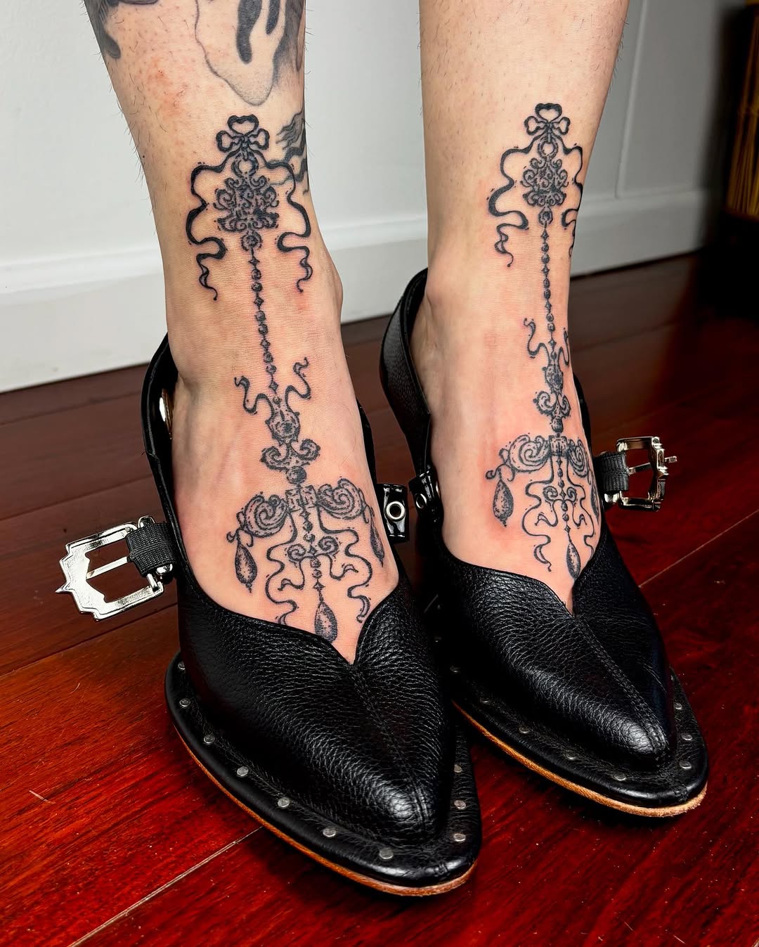 Ornamental chandelier-like designs on feet cyber sigilism tattoo on the foot by kendle