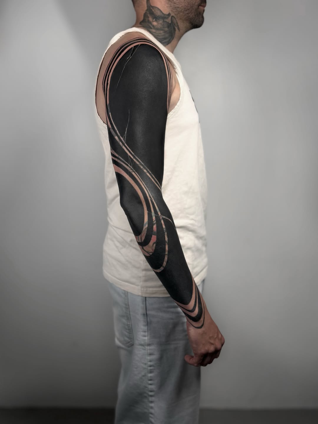 Abstract blackwork sleeve tribal tattoo on the upper arm by azchiara