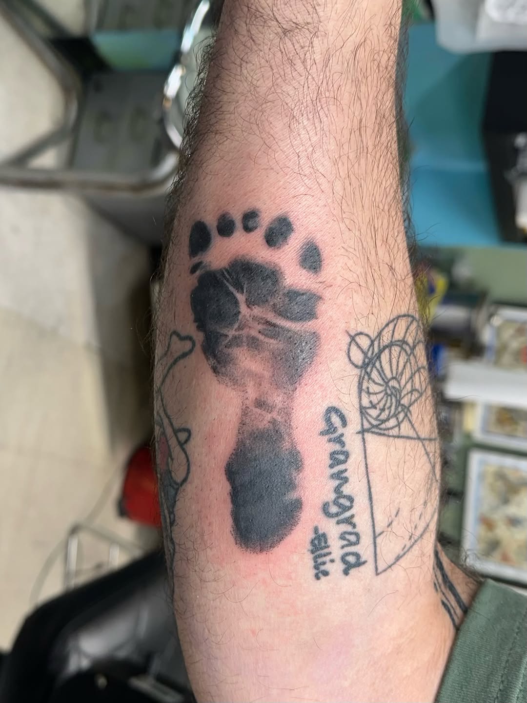 Tattoo by @rad.bananza — black_and_grey, lettering_script