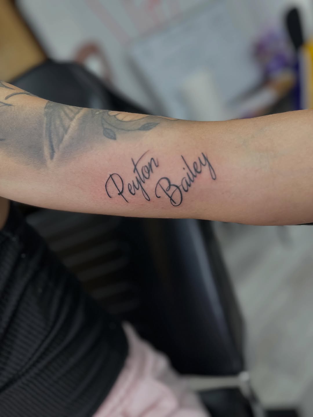 Names lettering tattoo on the forearm by Antonio