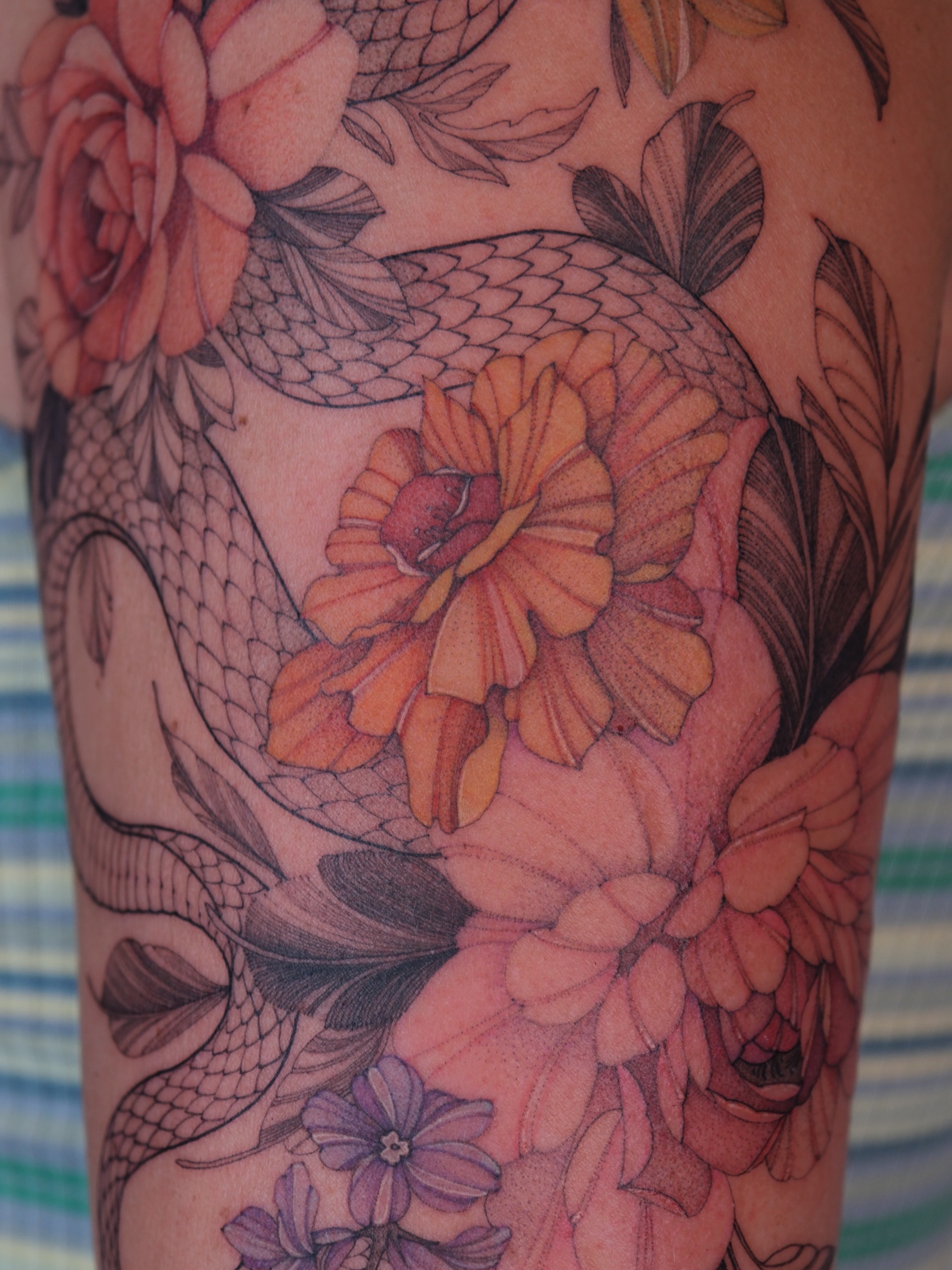 Koi fish and flowers japanese irezumi tattoo on the forearm by Flower Tattoo Sf