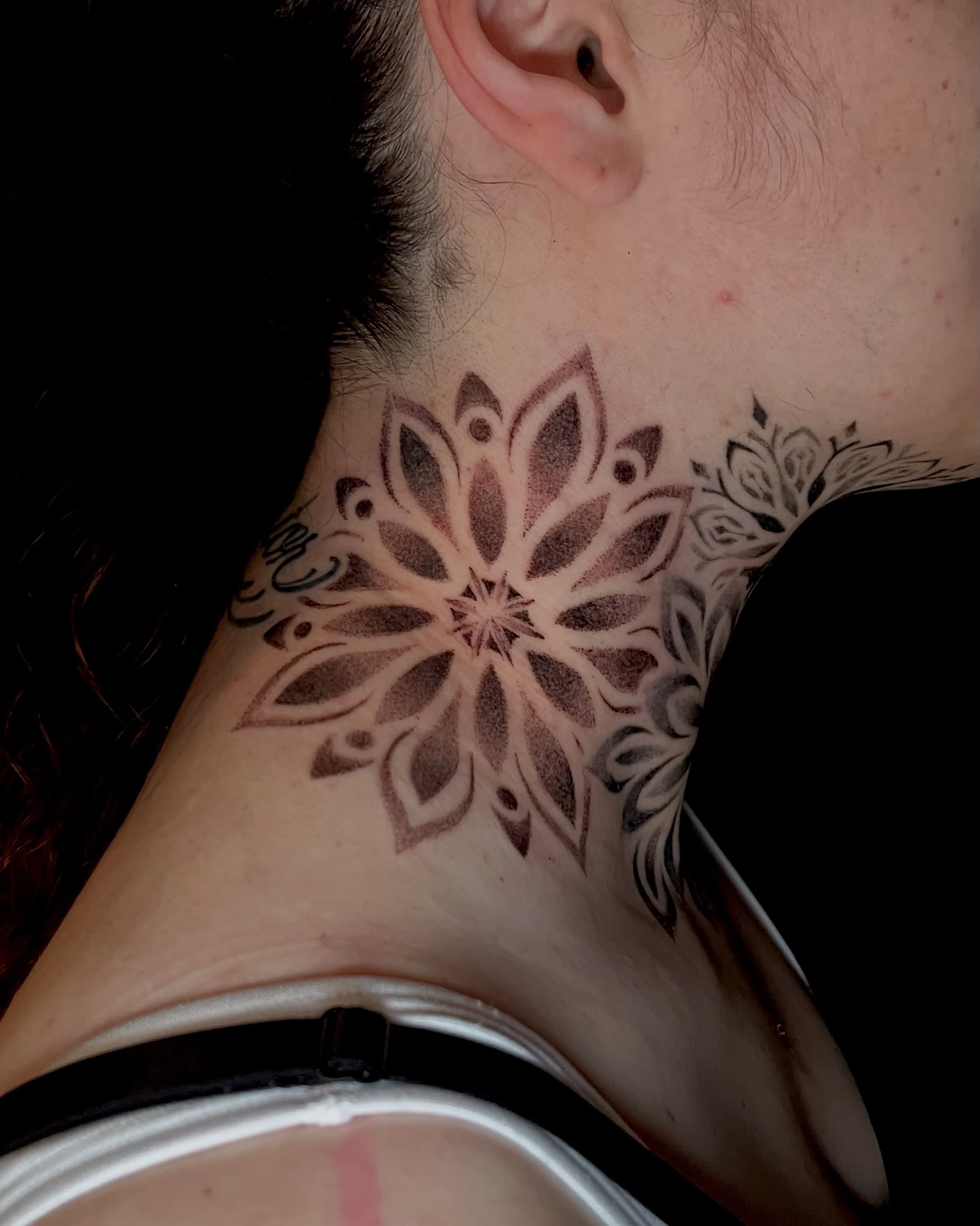 Lotus flower geometric tattoo on the neck by EO, Chicago, Illinois