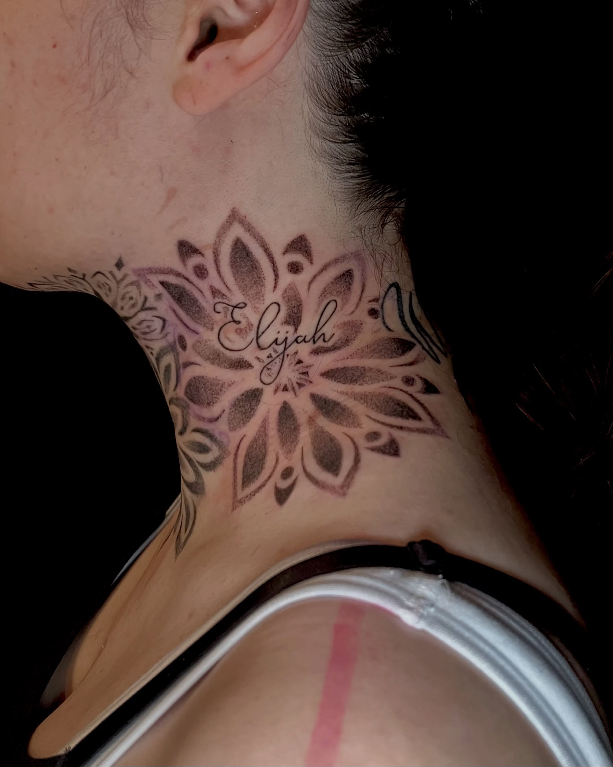 Lotus flower black and grey tattoo on the neck by EO, Chicago, Illinois