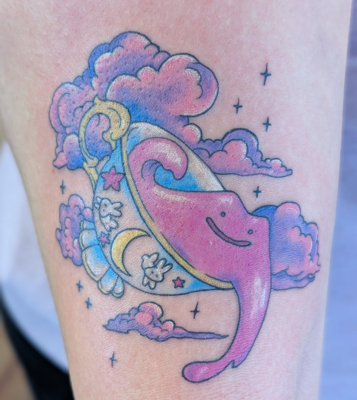 Unicorns and clouds new school tattoo on the thigh by Chad Nuber