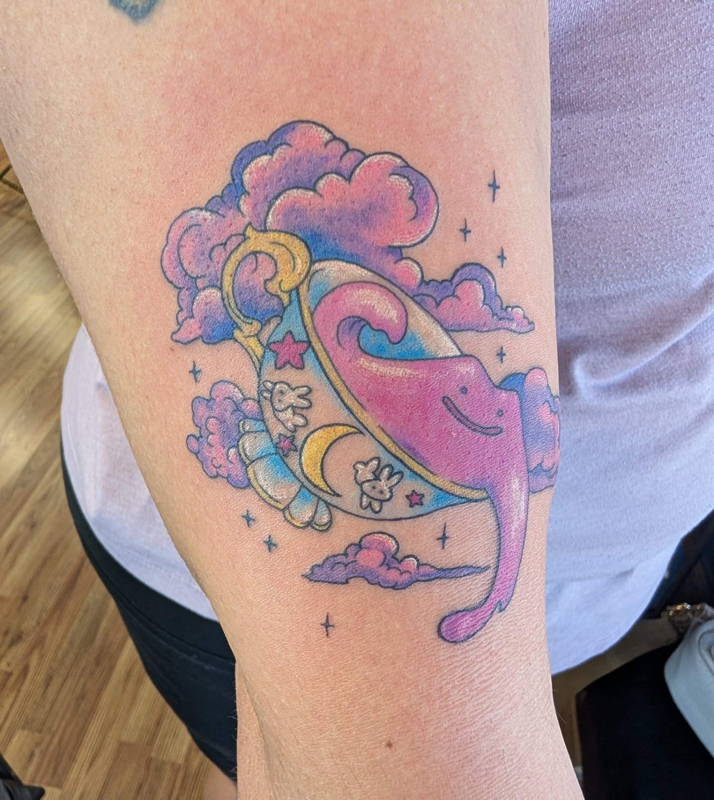 Space-themed creature new school tattoo on the forearm by Chad Nuber