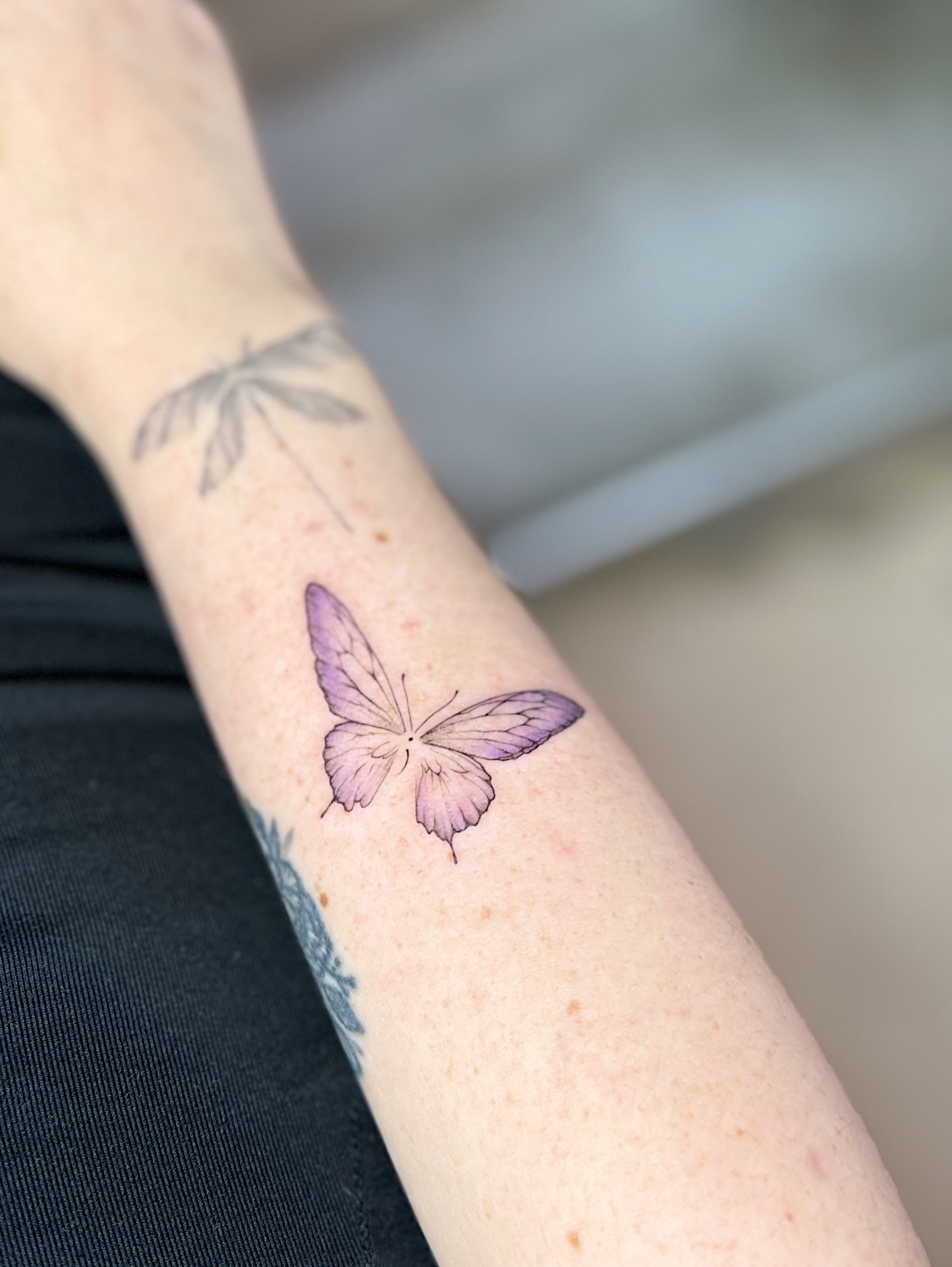 Butterfly watercolor tattoo on the forearm by INK with Christian, Mineral Wells, Texas