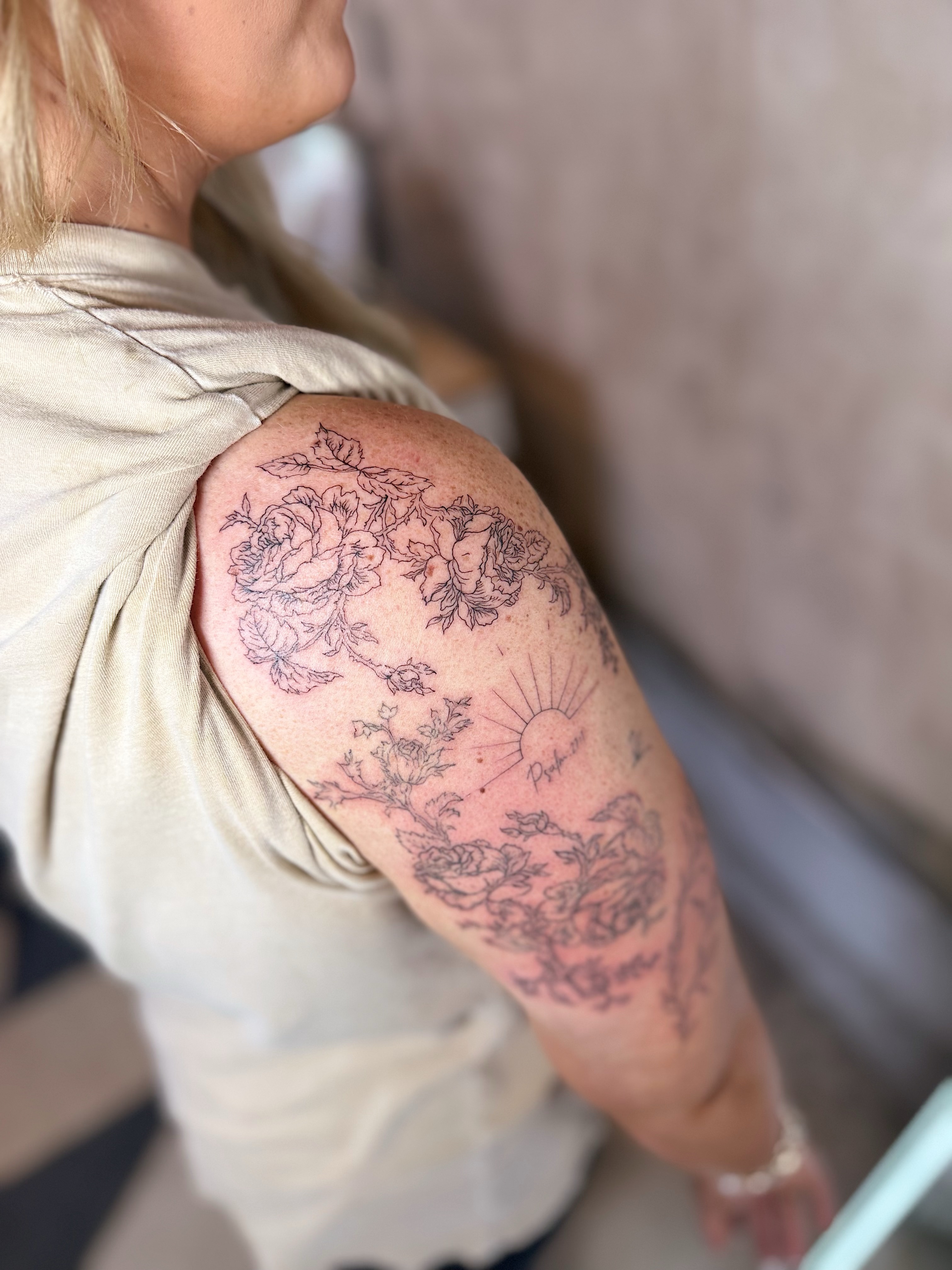 Floral bouquet black and grey tattoo on the shoulder by INK with Christian, Mineral Wells, Texas