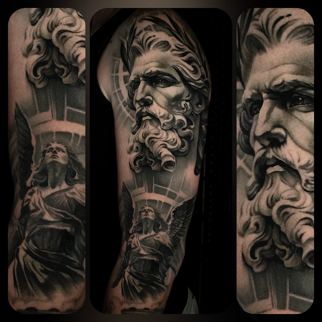 God and angel realism tattoo on the forearm by Luke Benavidez