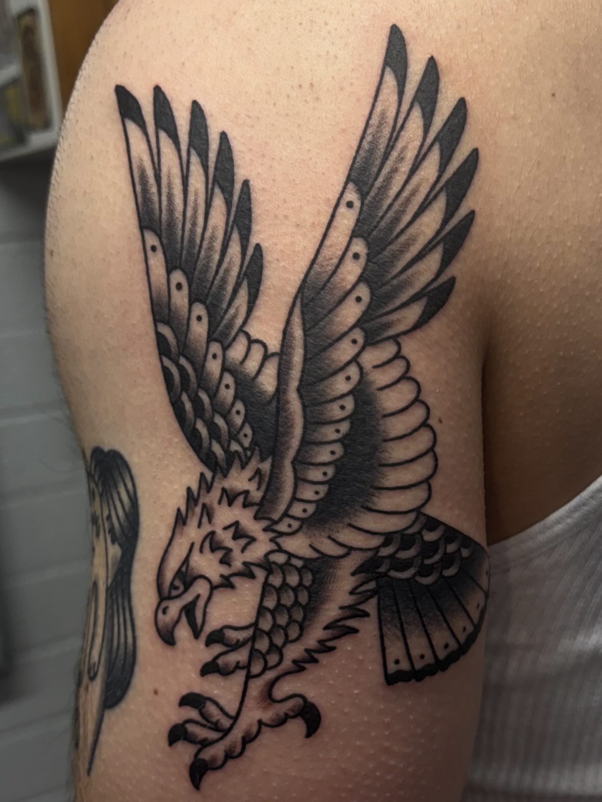 Eagle black and grey tattoo on the shoulder by ๐๐๐ฑ๐ฑ๐ฌ๐ฌ ๐๐ฏ๐ฑ๐ฆ๐ฐ๐ฑ