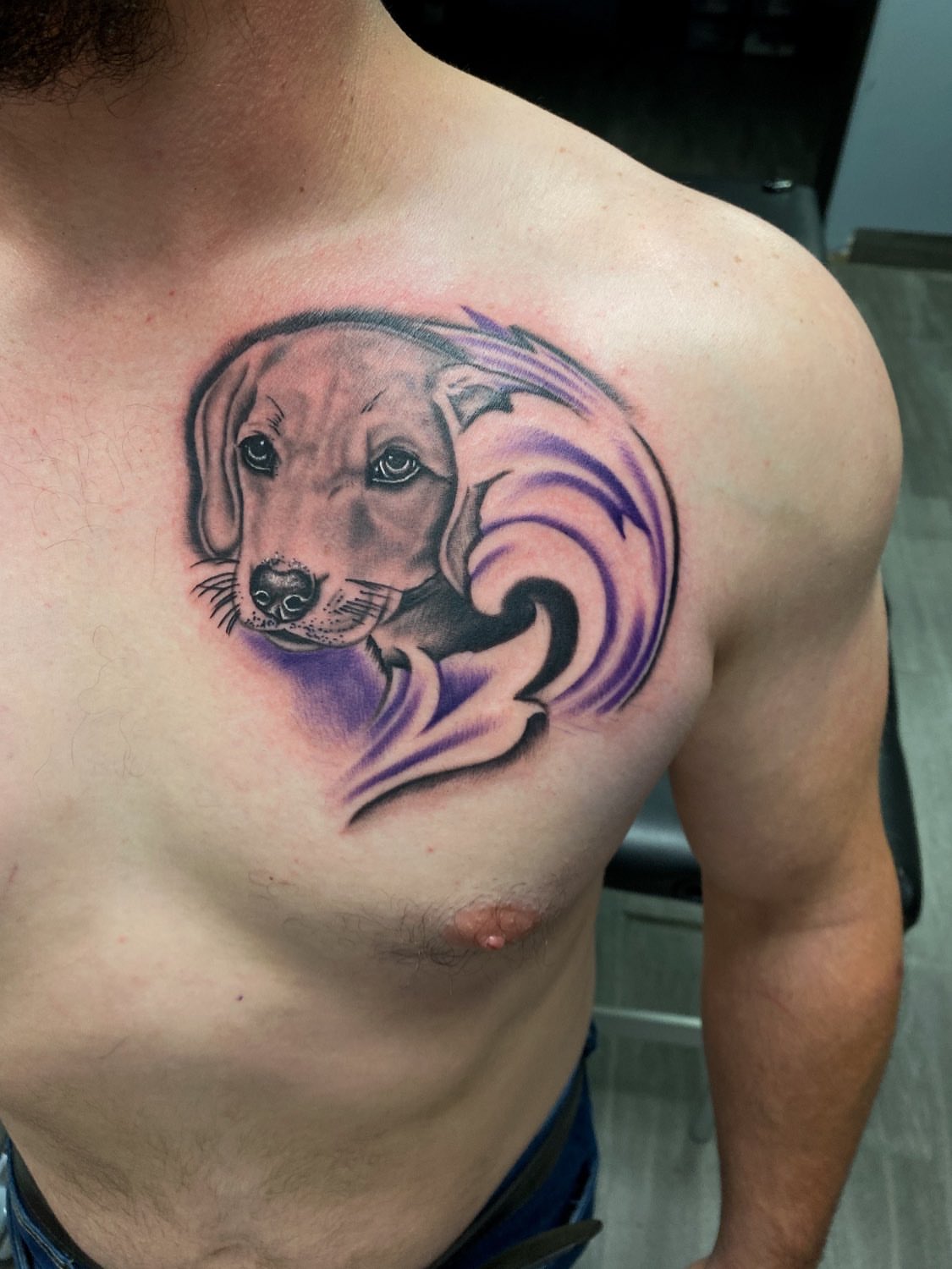 Dog realism tattoo on the chest by Kelan Mckenna