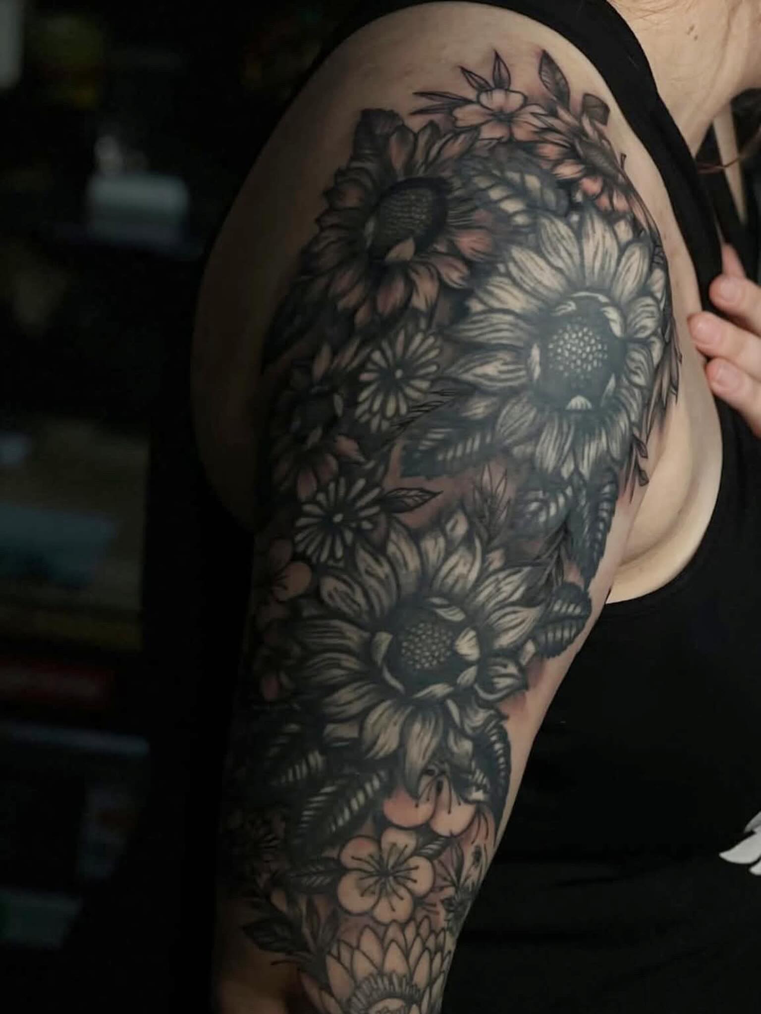 Sunflowers black and grey tattoo on the shoulder by Tattoomobile