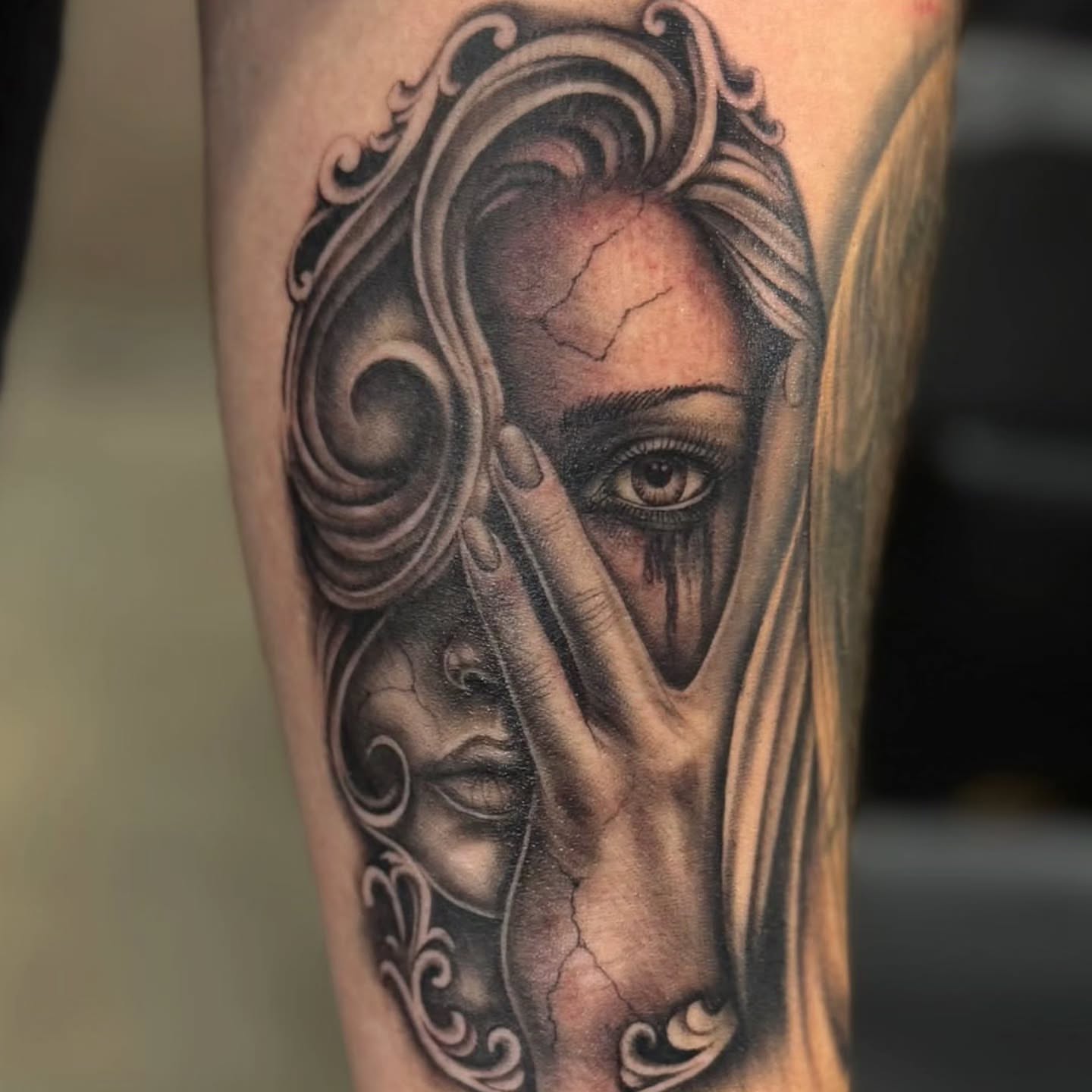 Woman's face realism tattoo on the forearm by North County Sd