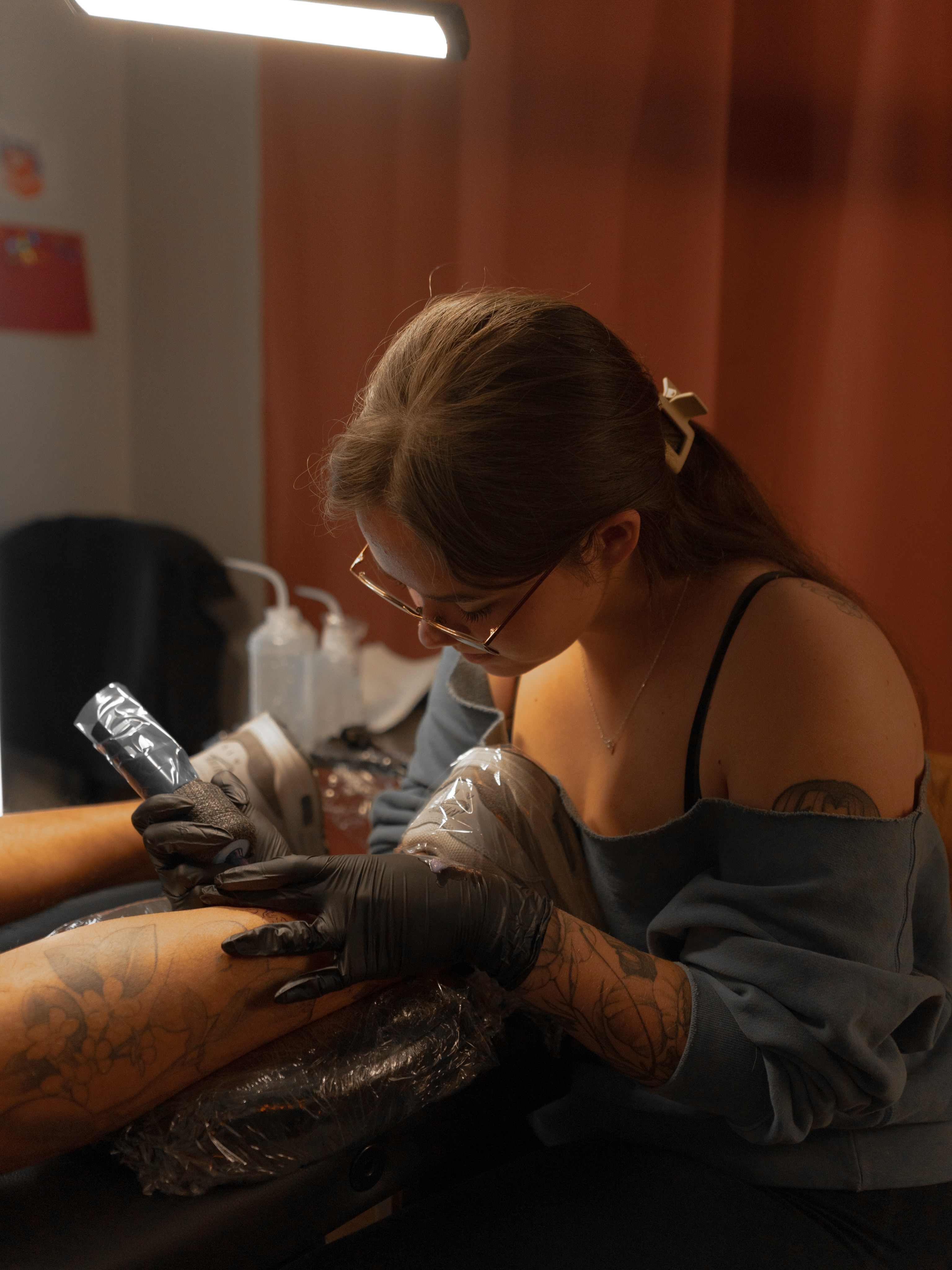 Floral design black and grey tattoo on the leg by Jen- San Antonio tattoo artist