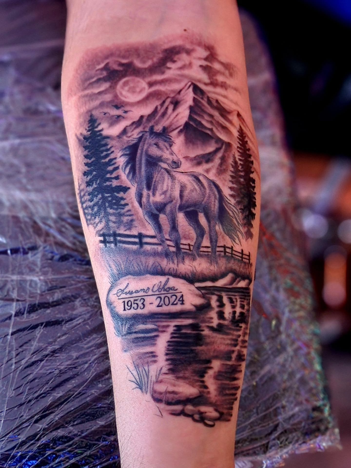 Horses and landscape realism tattoo on the forearm by Luke Jordan Ink, Louisville, Colorado