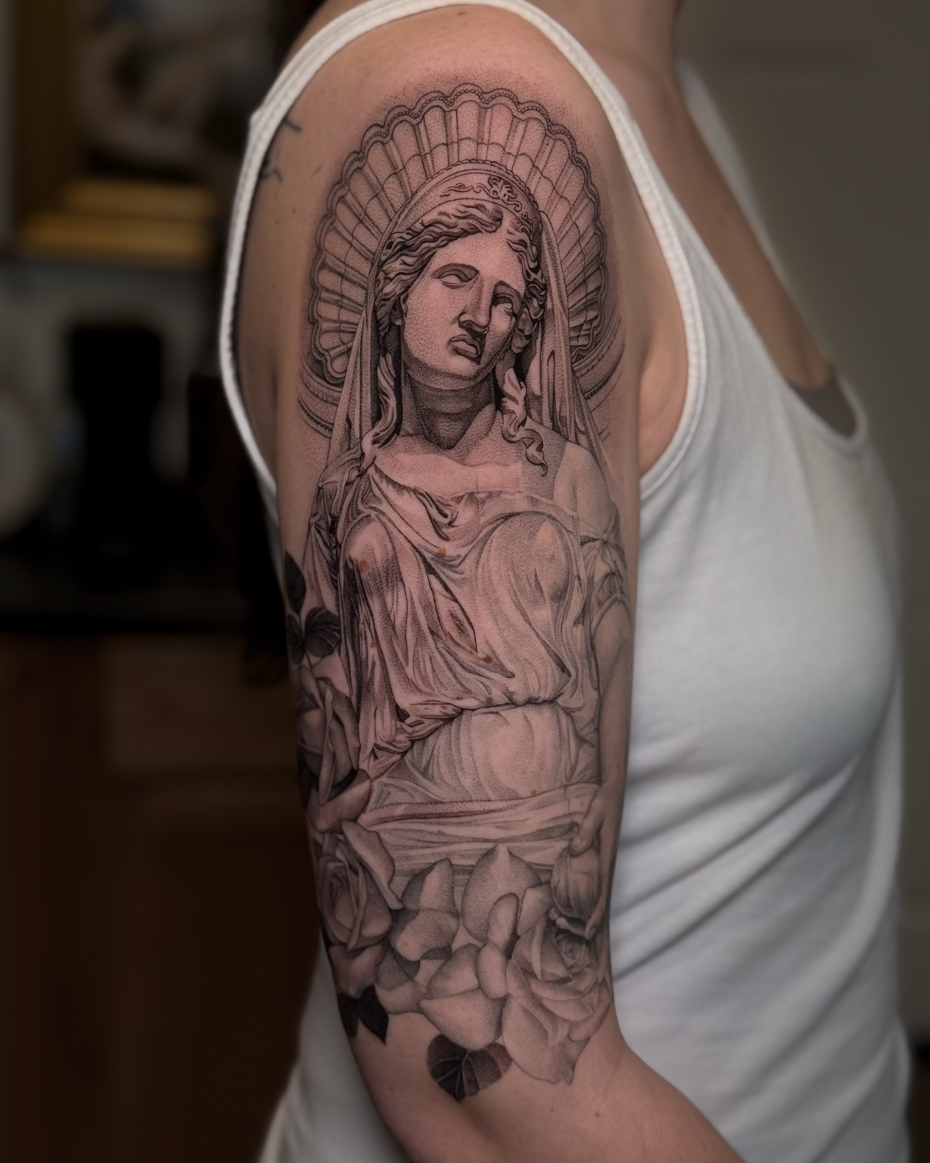 Statue realism tattoo on the upper arm by ♡ 𝕍𝕚𝕔𝕥𝕠𝕣𝕚𝕒 ℍ𝕠𝕝𝕞𝕖𝕤 ♡, Avon, Ohio