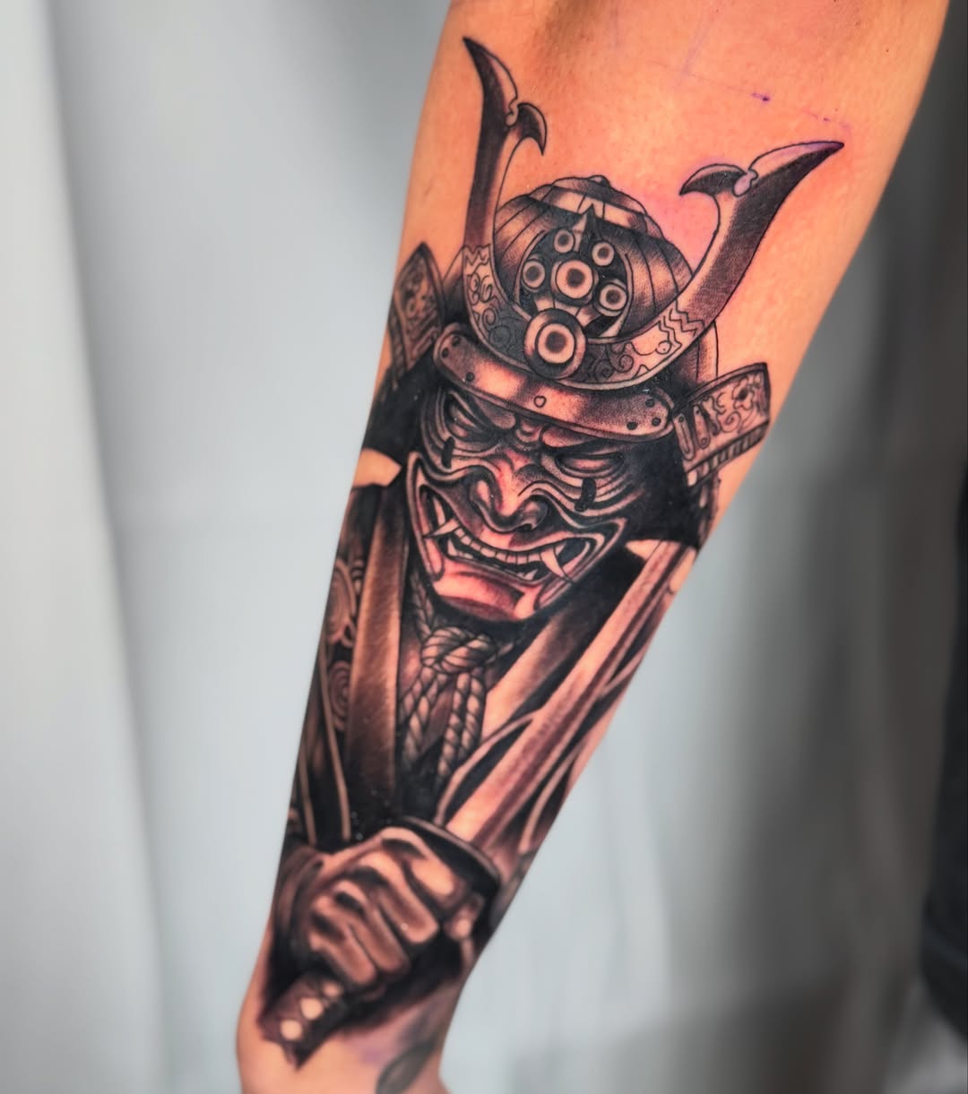 Samurai warrior realism tattoo on the forearm by Tevin Thomas