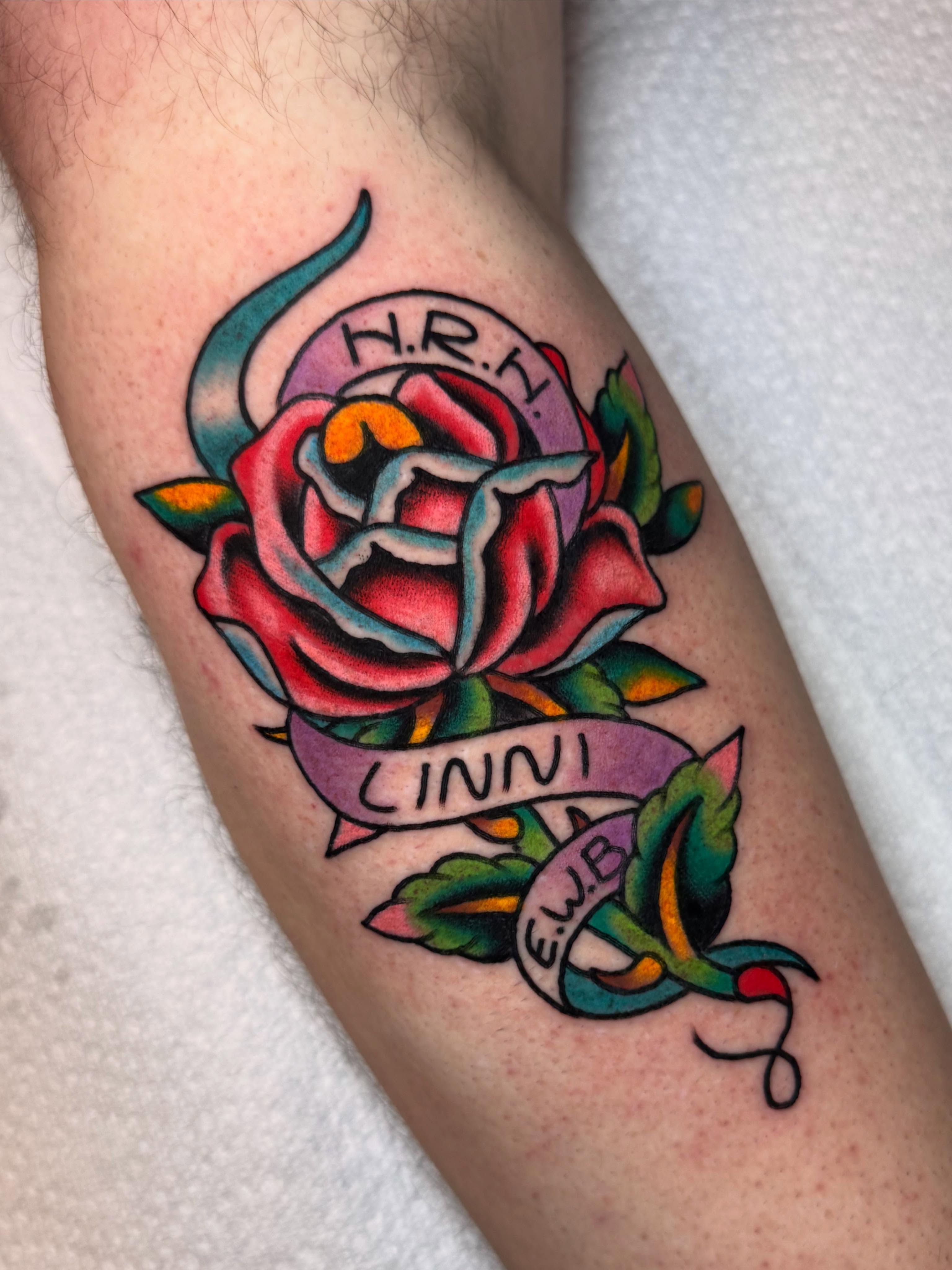Rose American traditional tattoo on the thigh by Jonathan Clapp, San Antonio, Texas