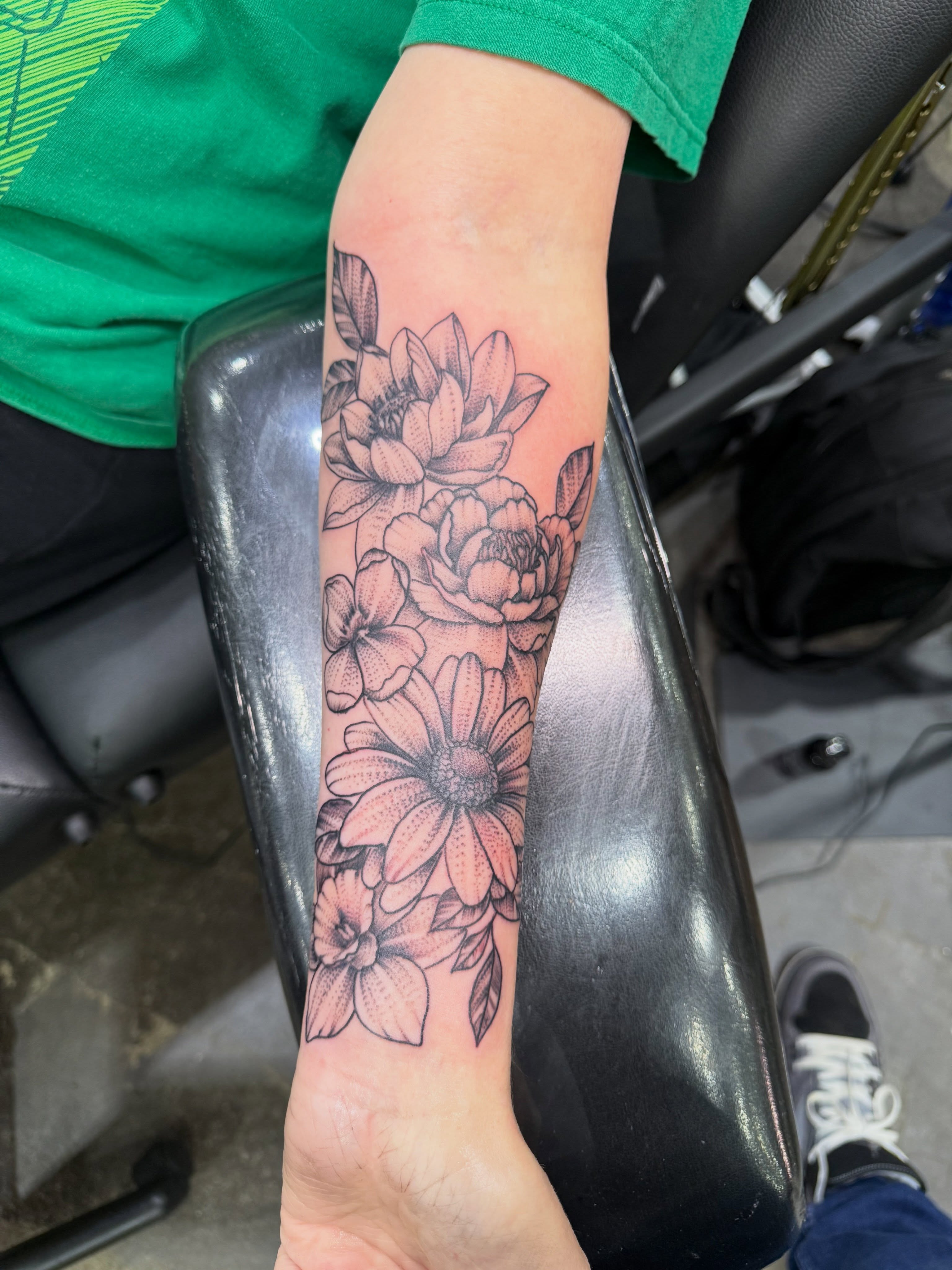 Floral bouquet black and grey tattoo on the forearm by Dave Potavin, Erlanger, Kentucky