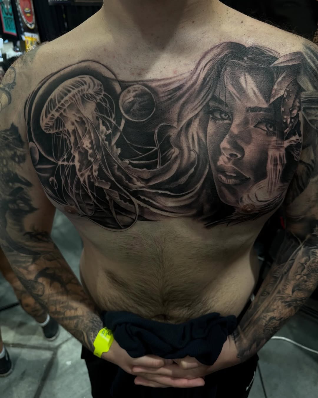 Woman and jellyfish Chicano tattoo on the chest by T, Saugus, Massachusetts