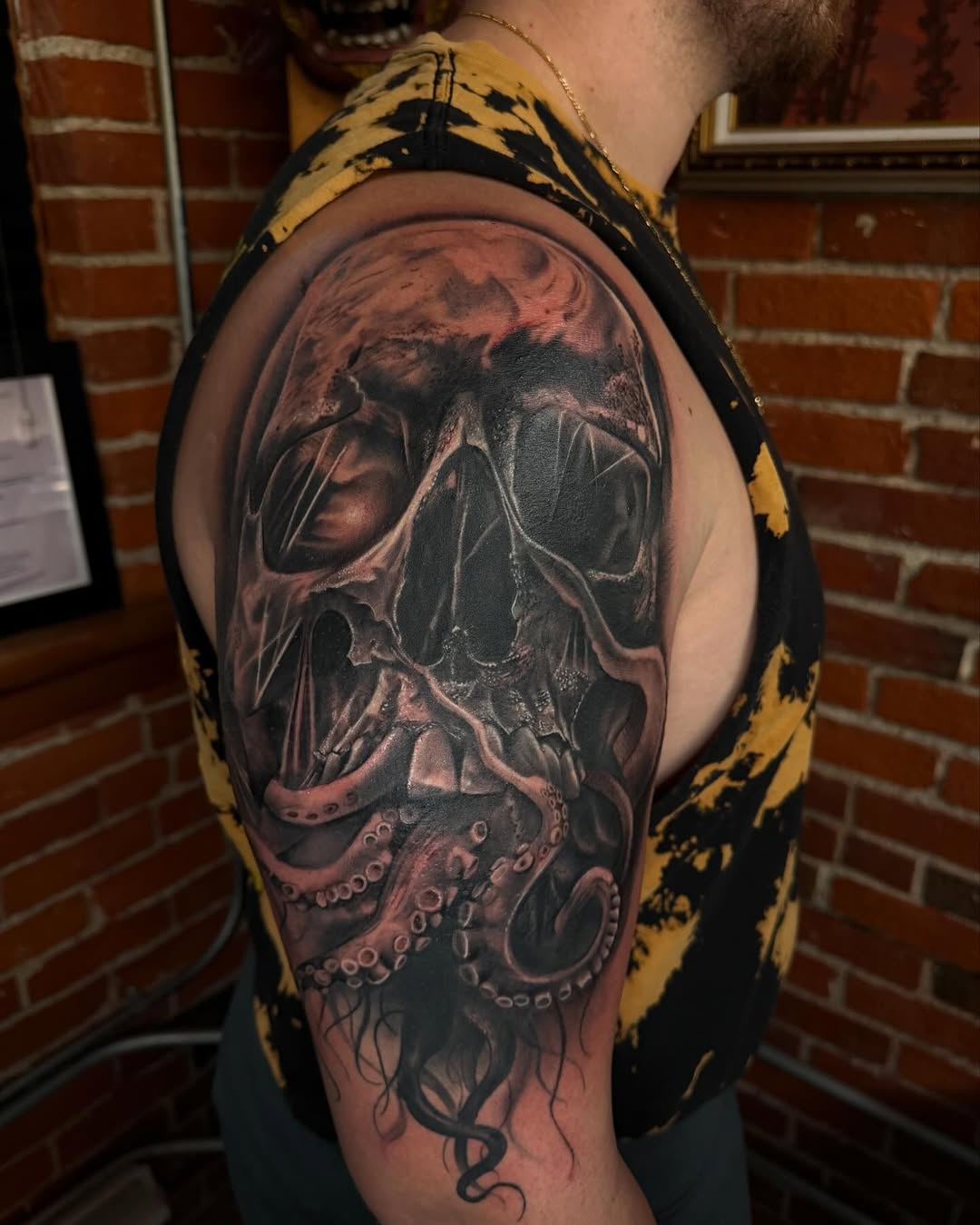 Skull and octopus tentacles realism tattoo on the shoulder by T, Saugus, Massachusetts