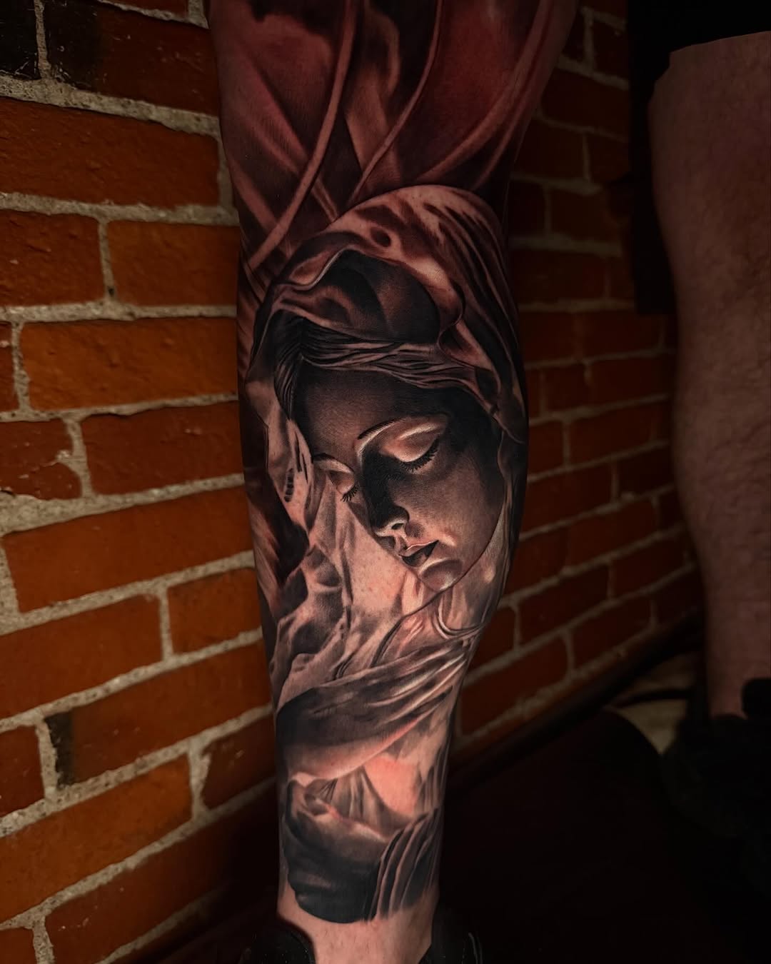Religious figure portrait Chicano tattoo on the forearm by T, Saugus, Massachusetts