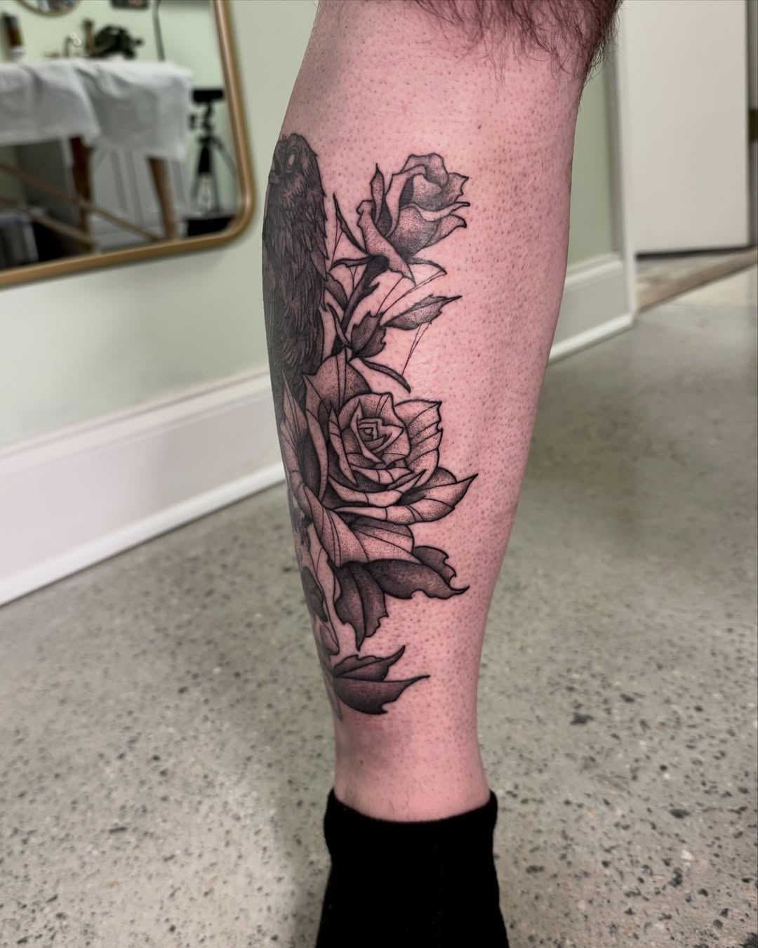 Roses dotwork tattoo on the calf by Eden Allen