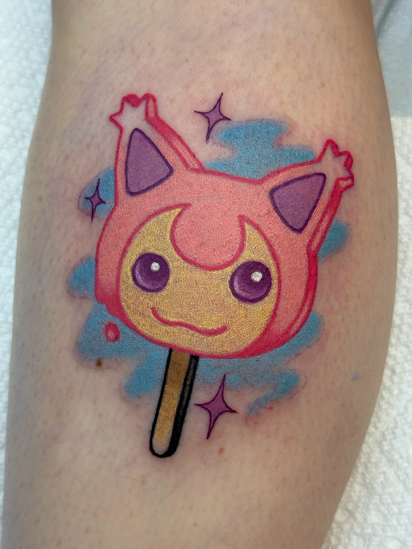 Jigglypuff lollipop new school tattoo on the forearm by vic