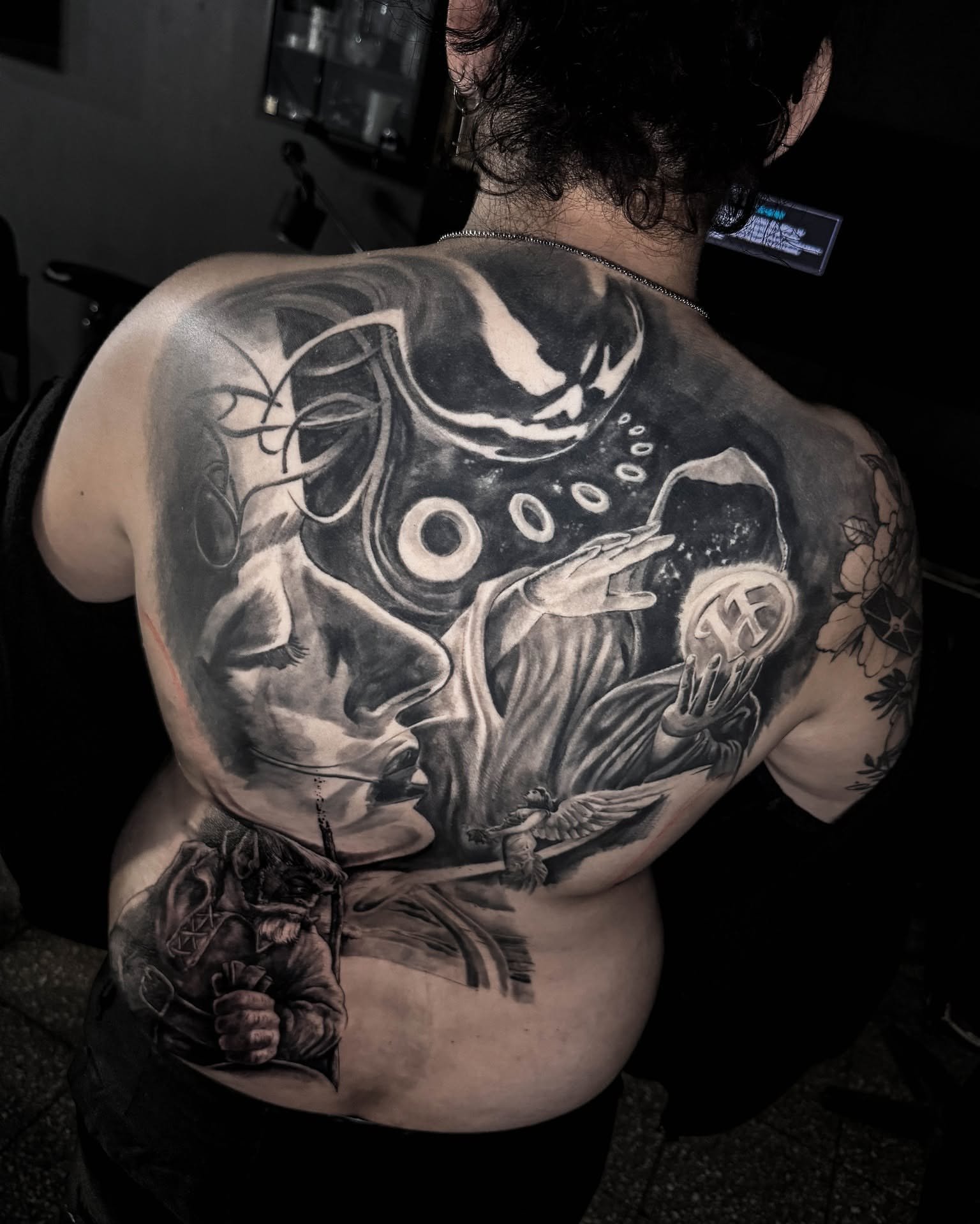 Abstract surrealism surrealism tattoo on the back by Bruno Moretti