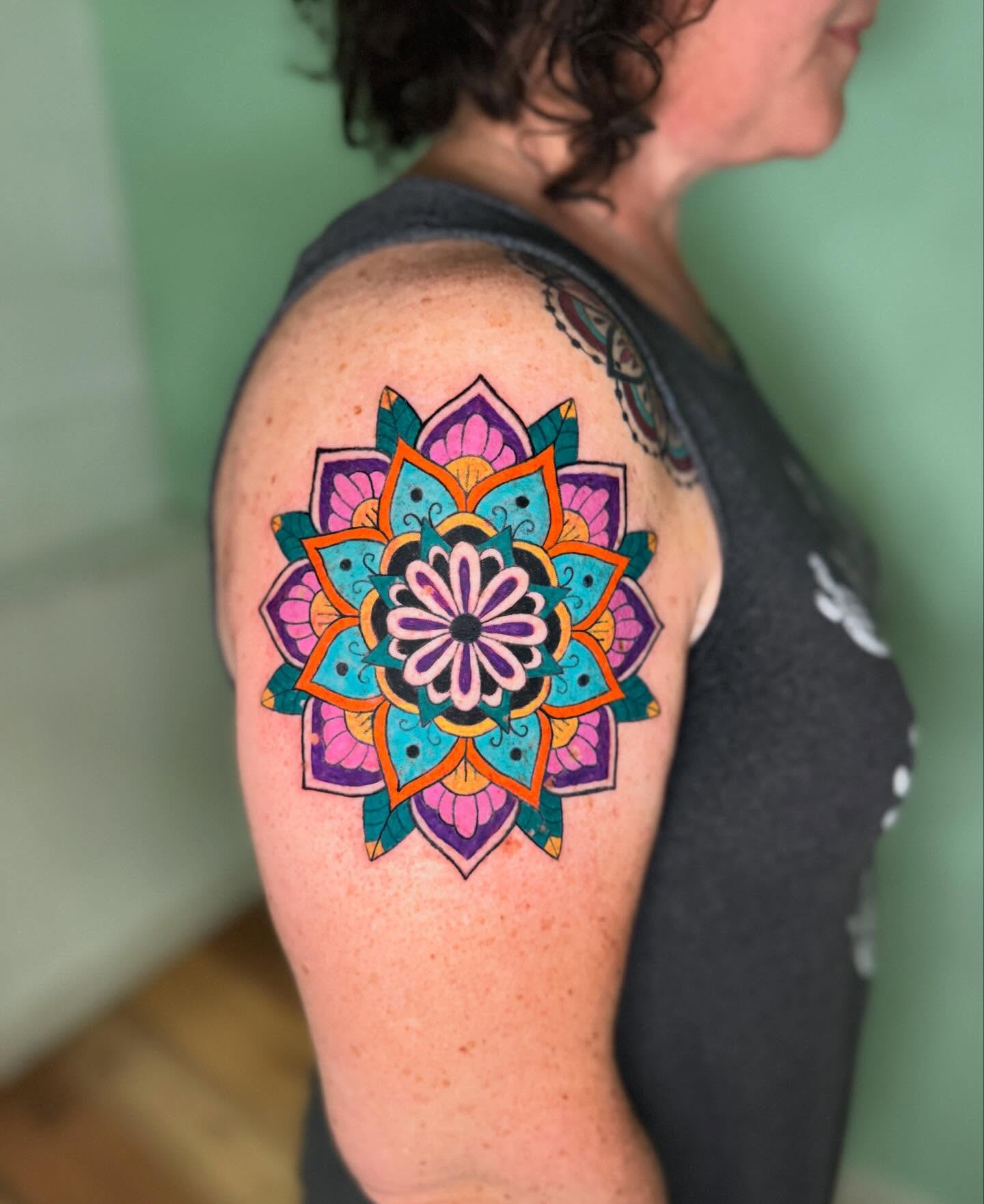 Mandala geometric tattoo on the shoulder by charlie