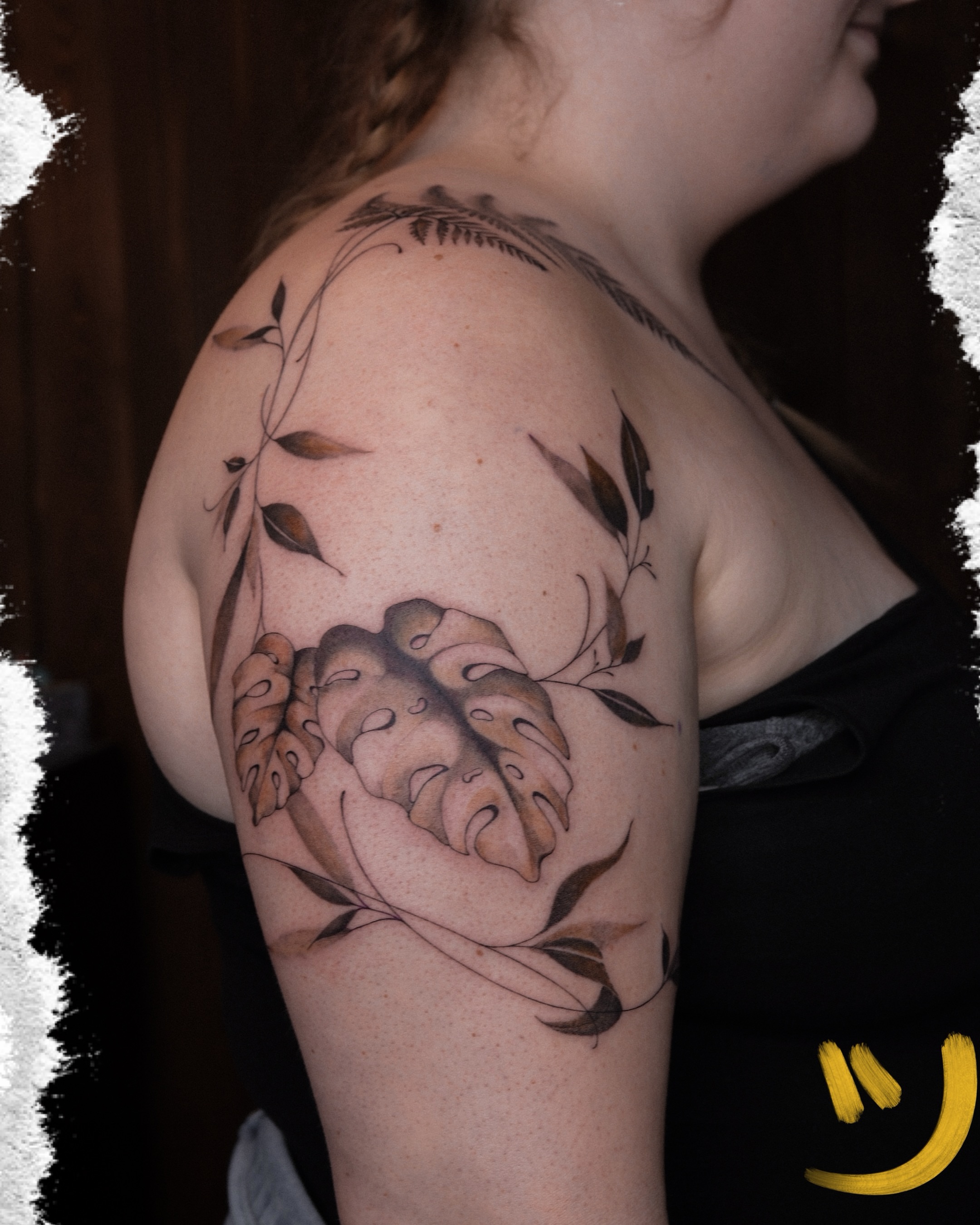 Monstera leaf black and grey tattoo on the shoulder by Alina 🌙 Tattoo in Calgary 🇨🇦