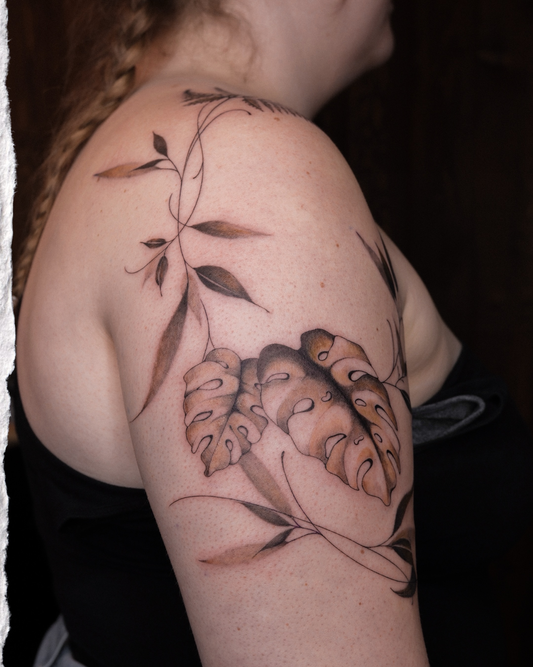 Peony black and grey tattoo on the shoulder by Alina 🌙 Tattoo in Calgary 🇨🇦