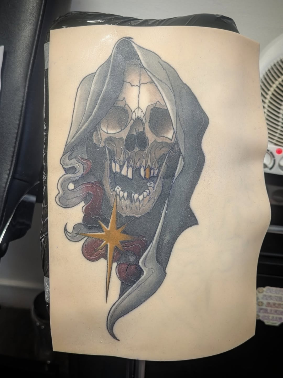 Grim reaper skull with star realism tattoo by Payton