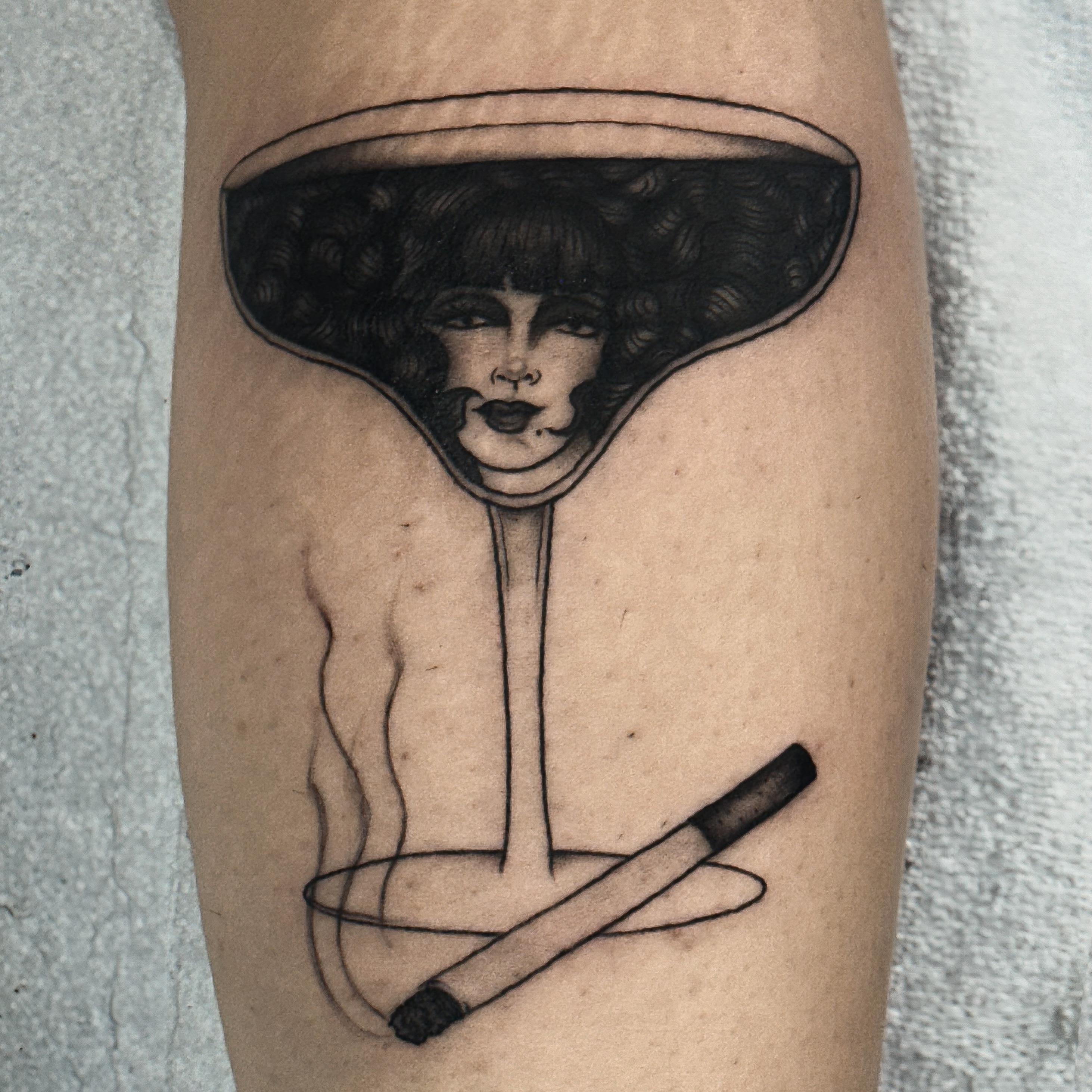 Woman with hat realism tattoo on the forearm by Victoria