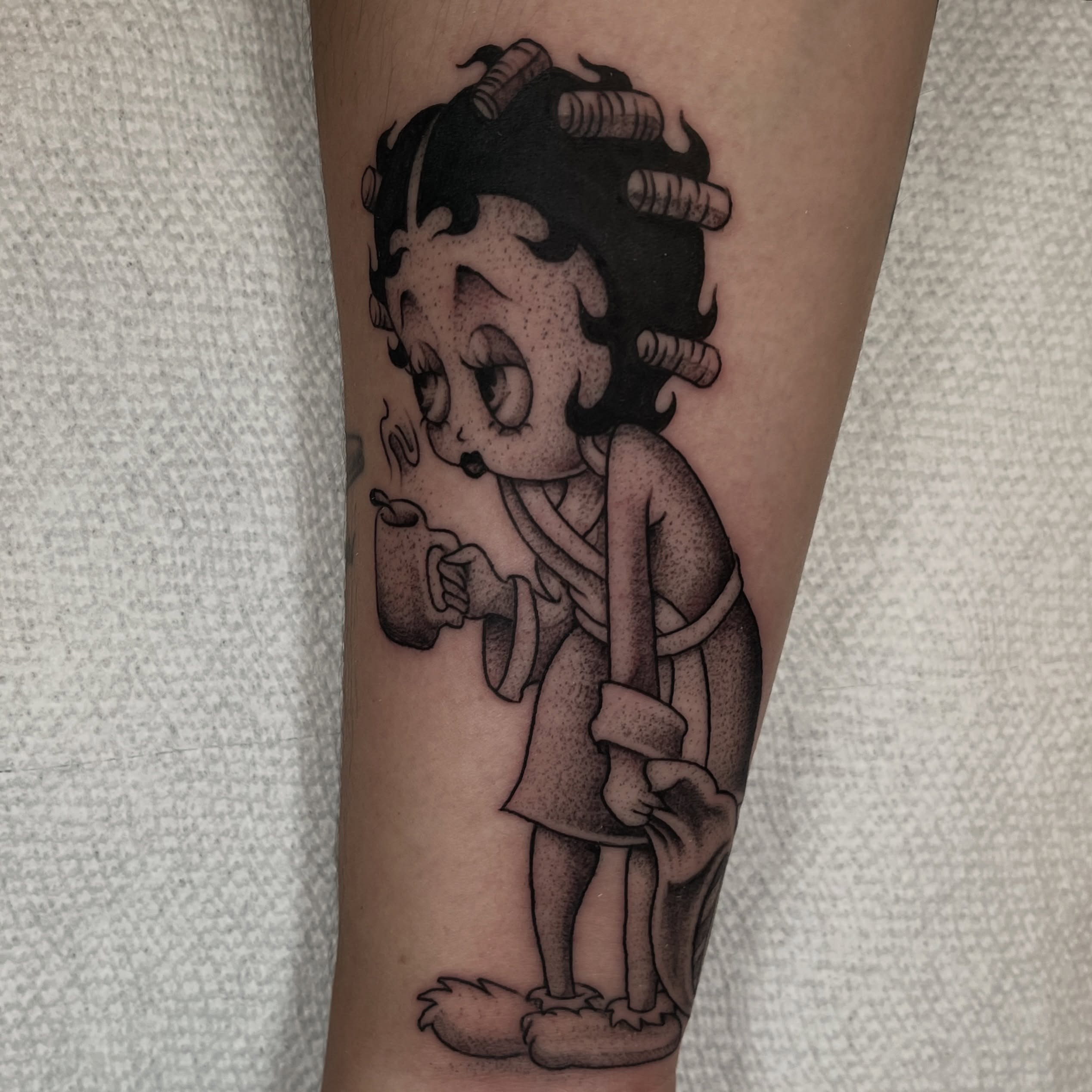 Betty Boop dotwork tattoo on the forearm by Jesus Pieces